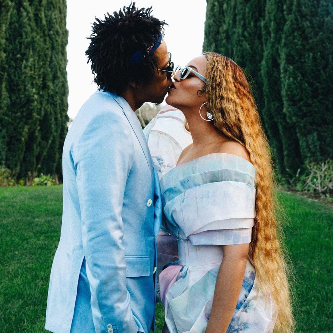 Jay-Z and Beyoncé wearing complementary outfits