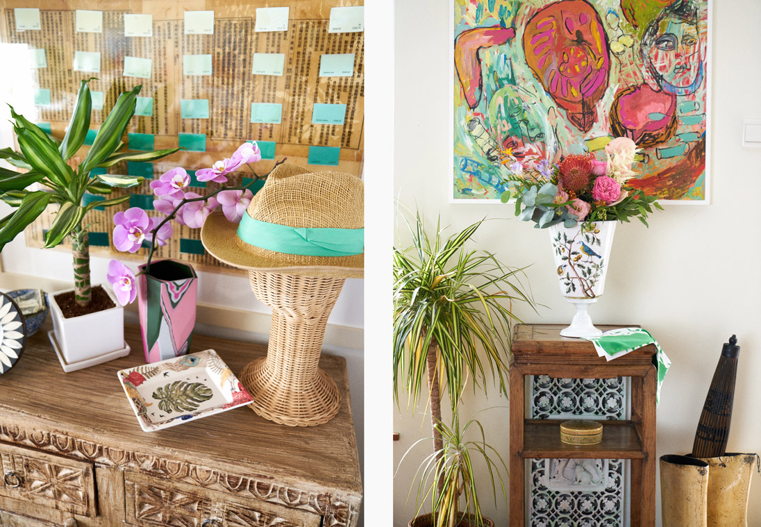 Left: The home is peppered with colourful accents, including a tray from La Cartuja de Sevilla and a vase from Elyse Graham, both available at Lane Crawford. Right: An Astier de Villatte x John Derian vase from Lane Crawford and a floral bouquet from Ellermann perch in front of Greer’s own artwork to create a pretty contrast of print and colour