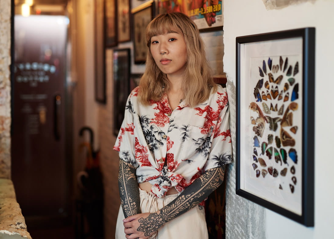 Tattoo artist Jenna Chu of Friday’s Tattoo works in the classic Japanese style