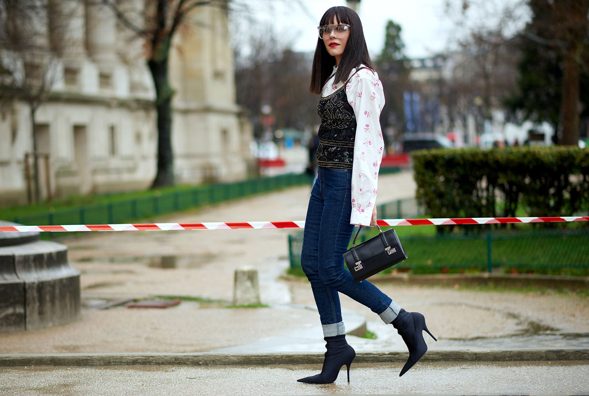 Stylist Evangelie Smyrniotaki (@styleheroine) demonstrates how to pair feminine prints with classic jeans on the streets of Paris