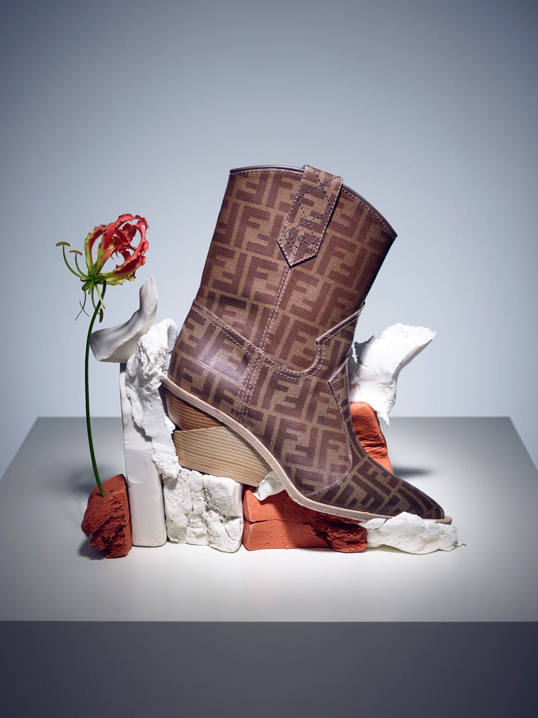 Today the cowboy boot represents adventure, and that mood is neatly summed up in Fendi’s glazed logo-motif pair