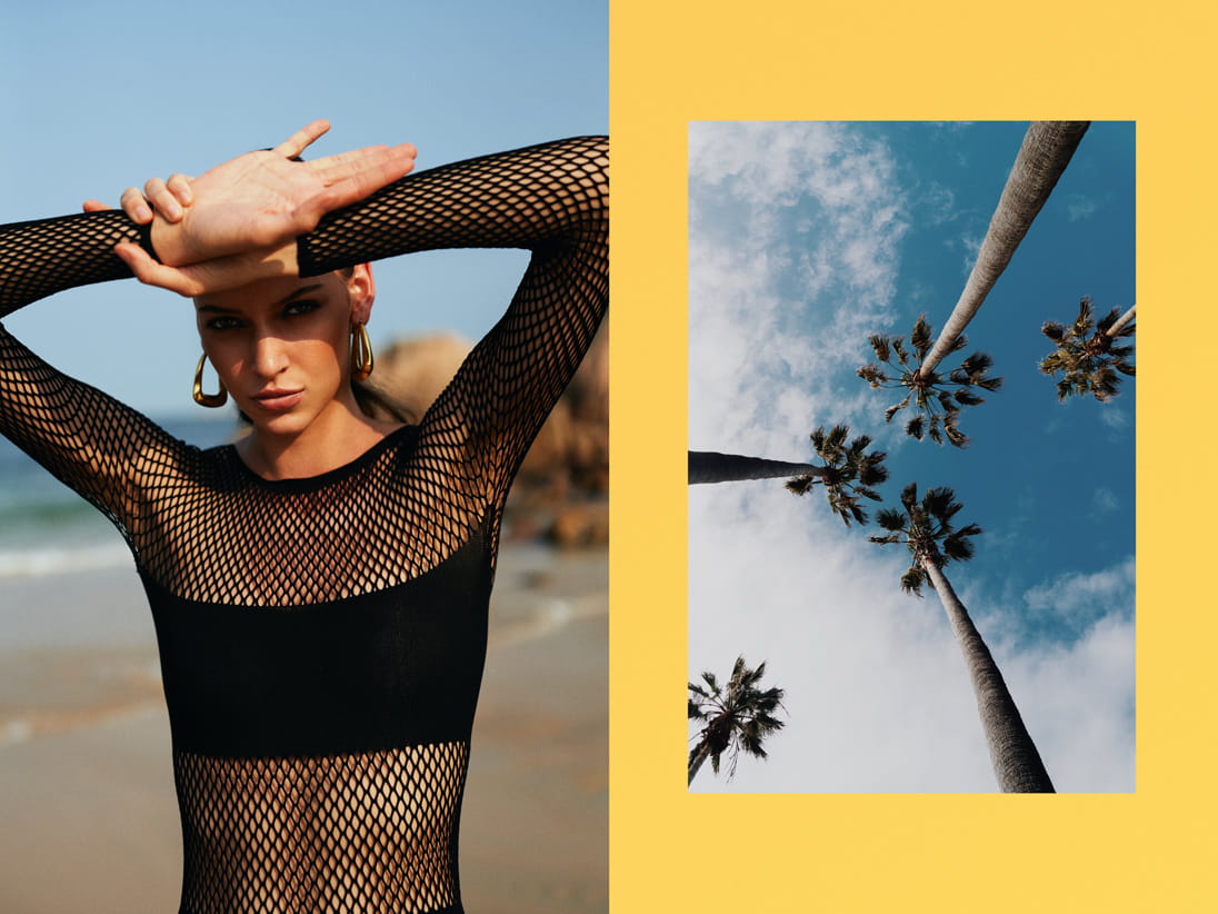 A model poses on the beach in a Dior mesh jumpsuit