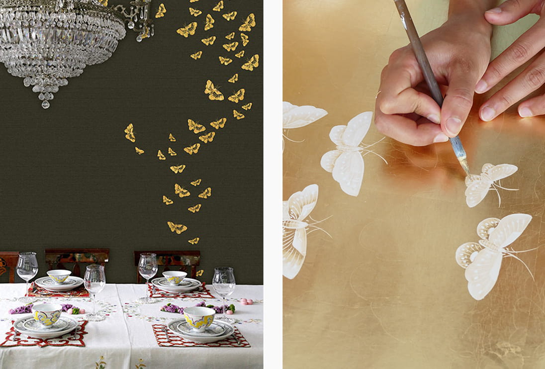 A dining table and a person drawing a butterfly