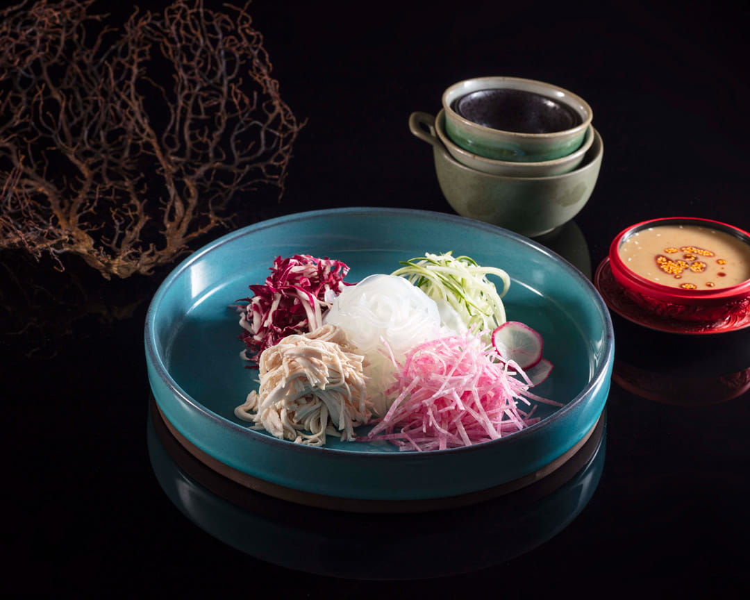 Shredded chicken in sesame sauce. Image courtesy of Peking Garden