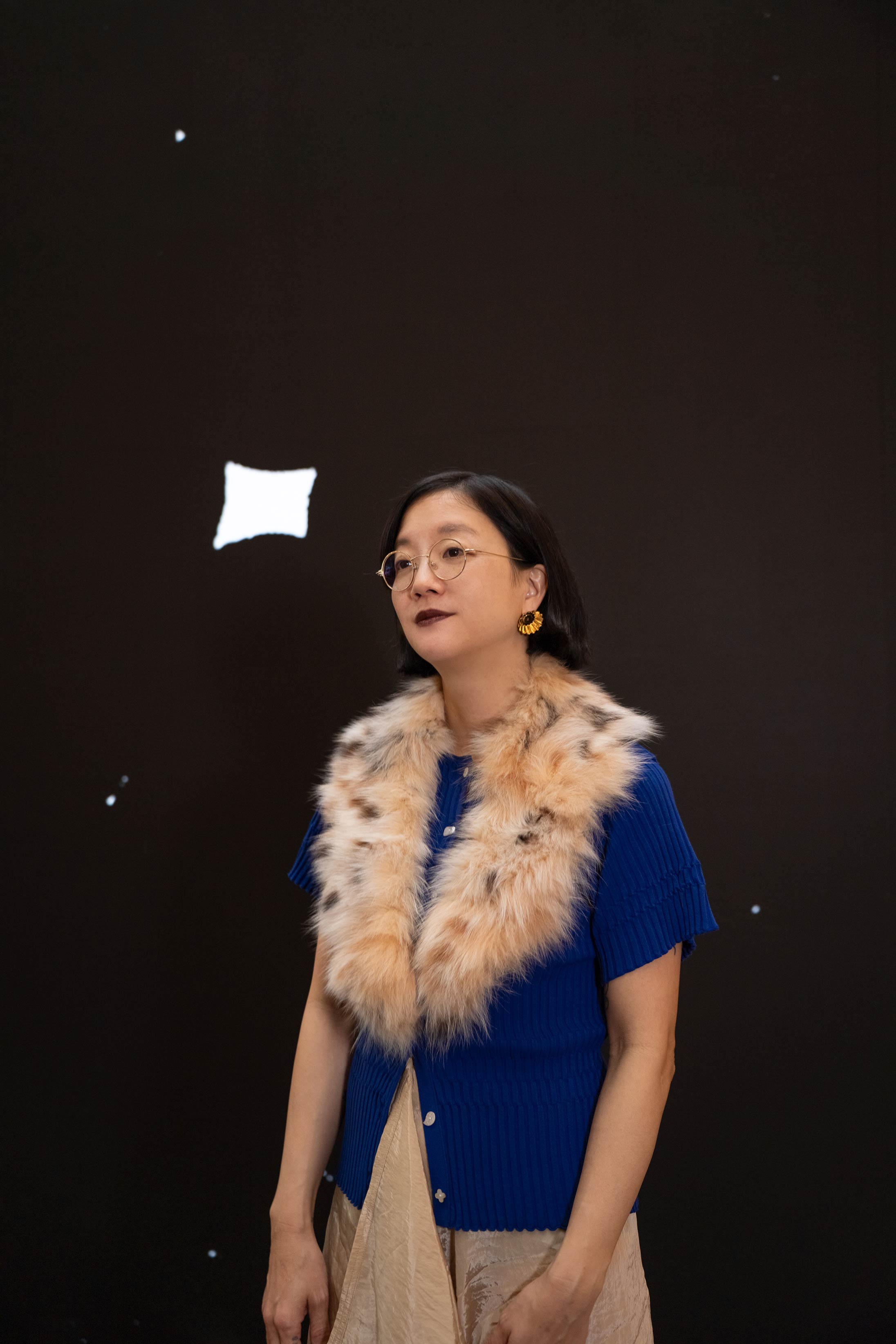 Artist Christine Sun Kim at her Pacific Place installation