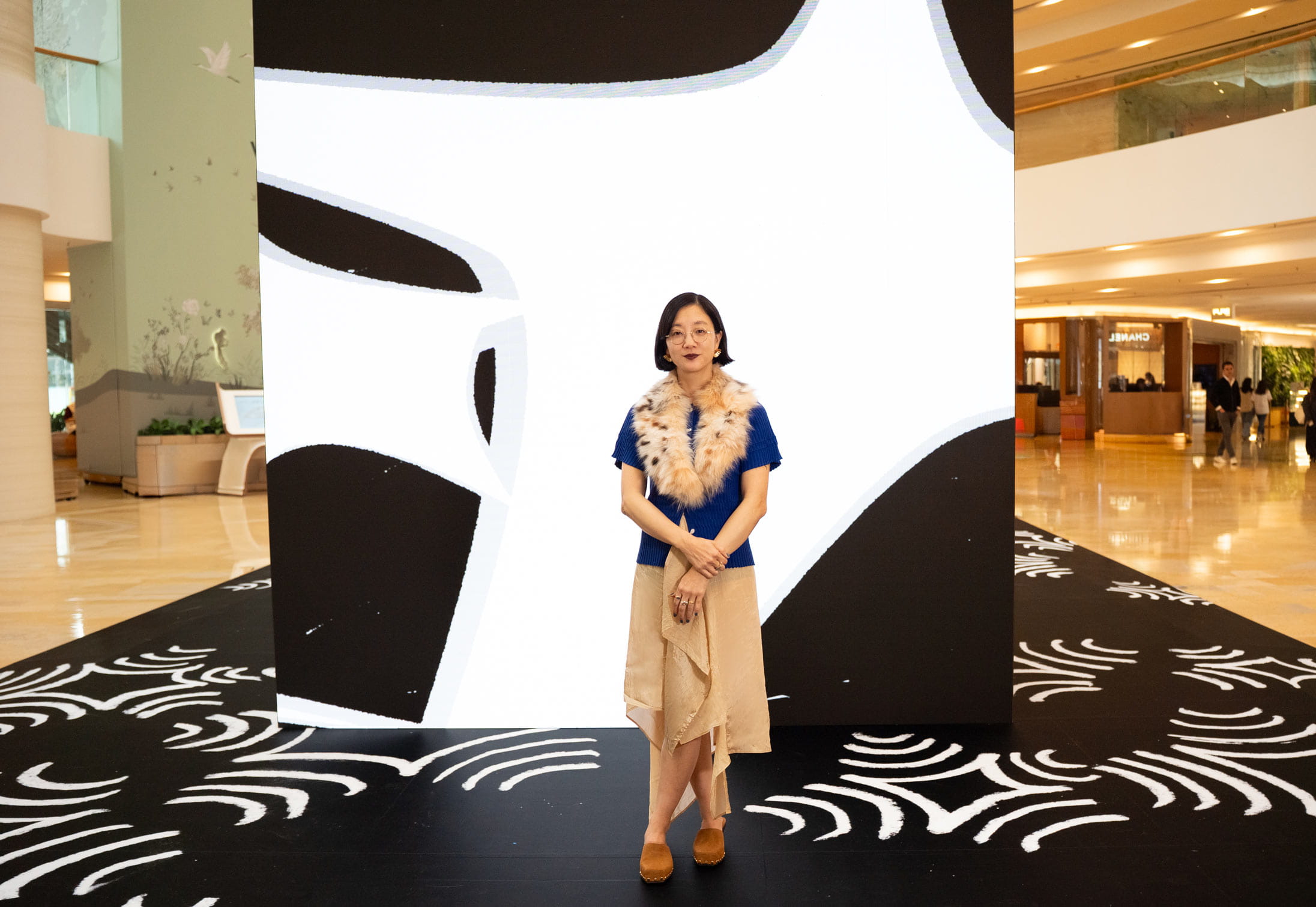 Artist Christine Sun Kim at her Pacific Place installation