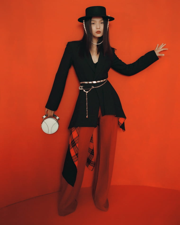 A model poses in Benoit Missolin, Monse, Dior, Chanel and Chloé