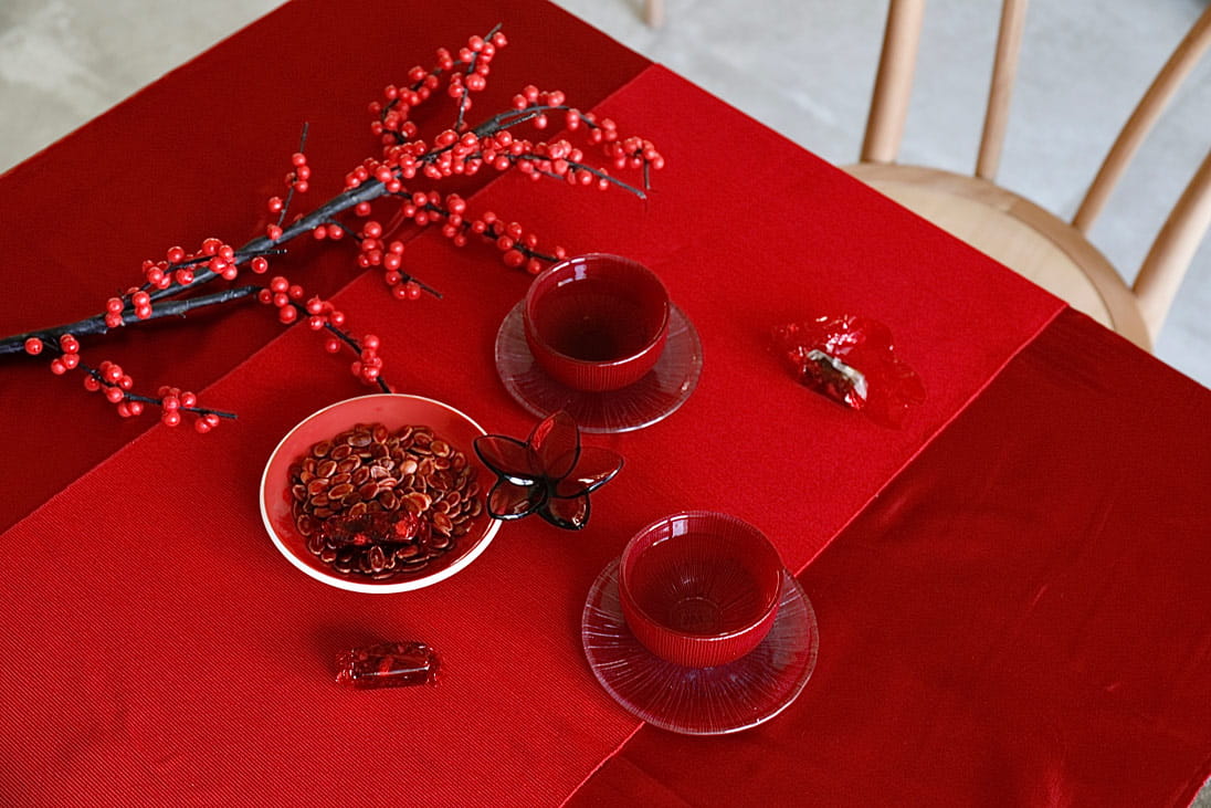 Chinese New Year table styling showing bold colours and textures