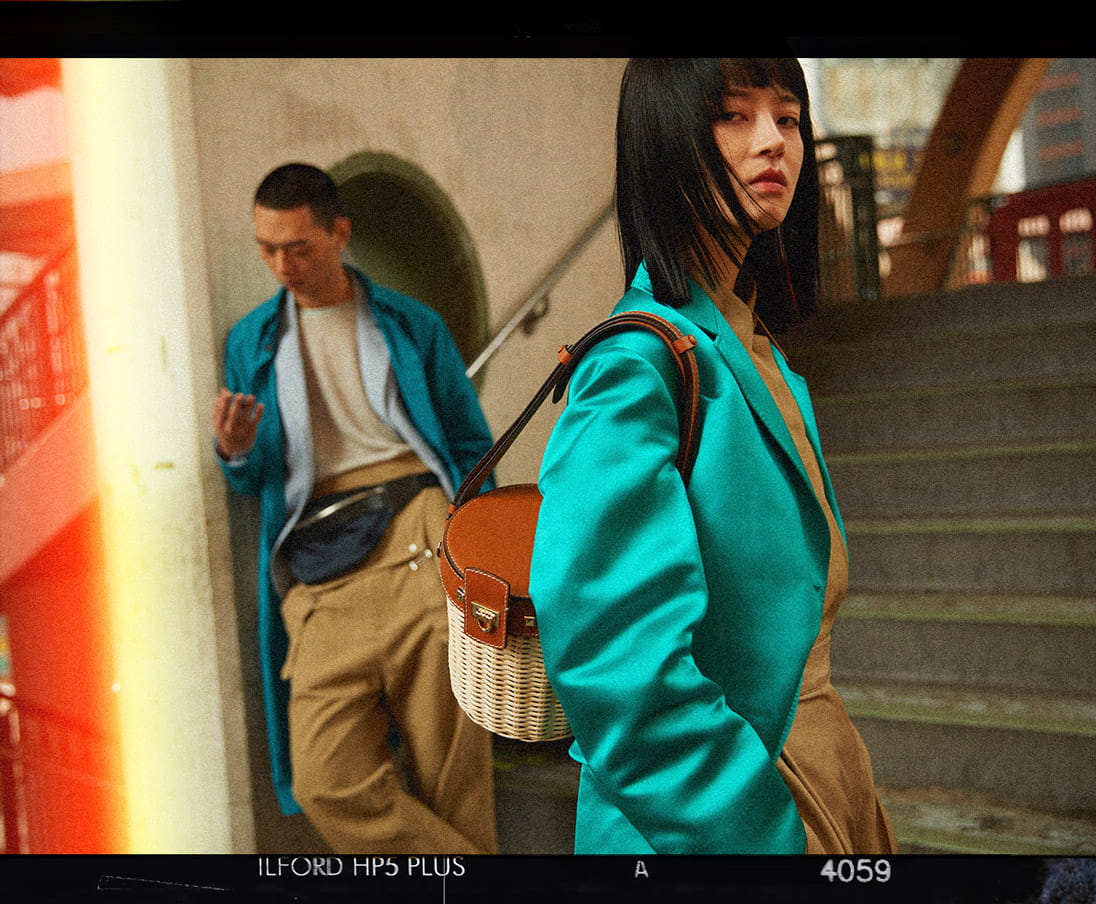 Models lounge in the latest looks from Salvatore Ferragamo