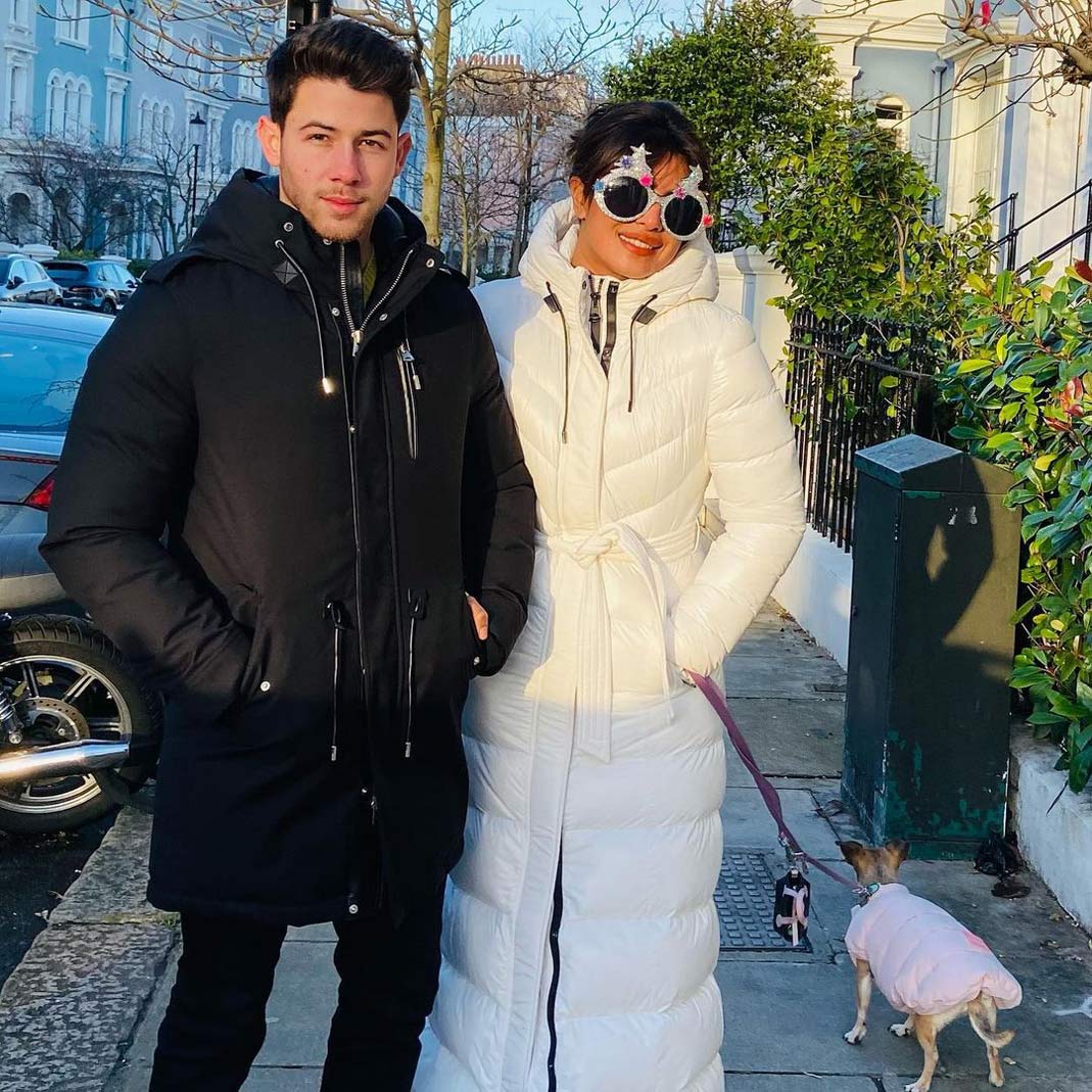 Priyanka Chopra and Nick Jonas wearing complementary outfits