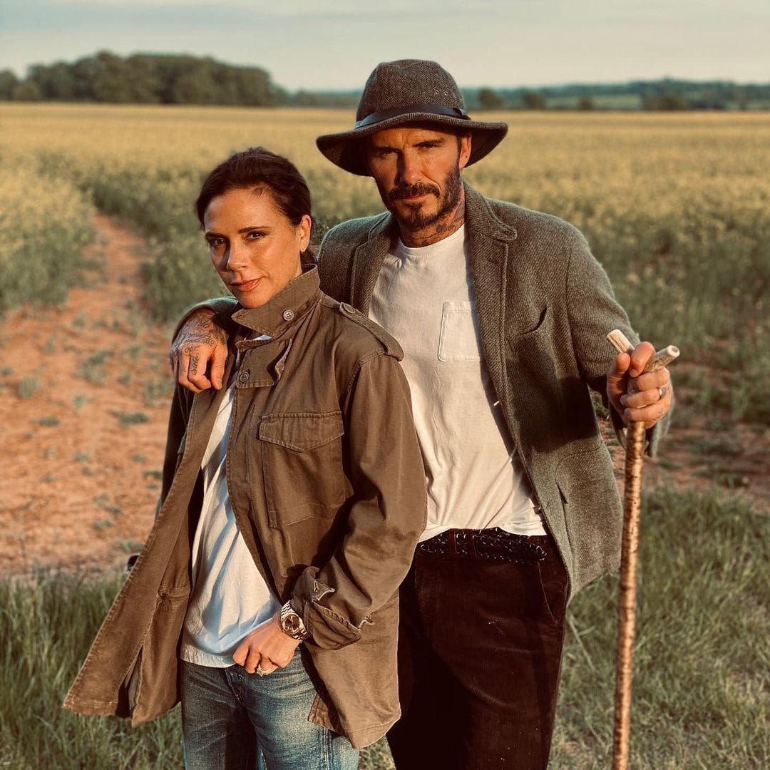 Victoria and David Beckham wearing complementary outfits