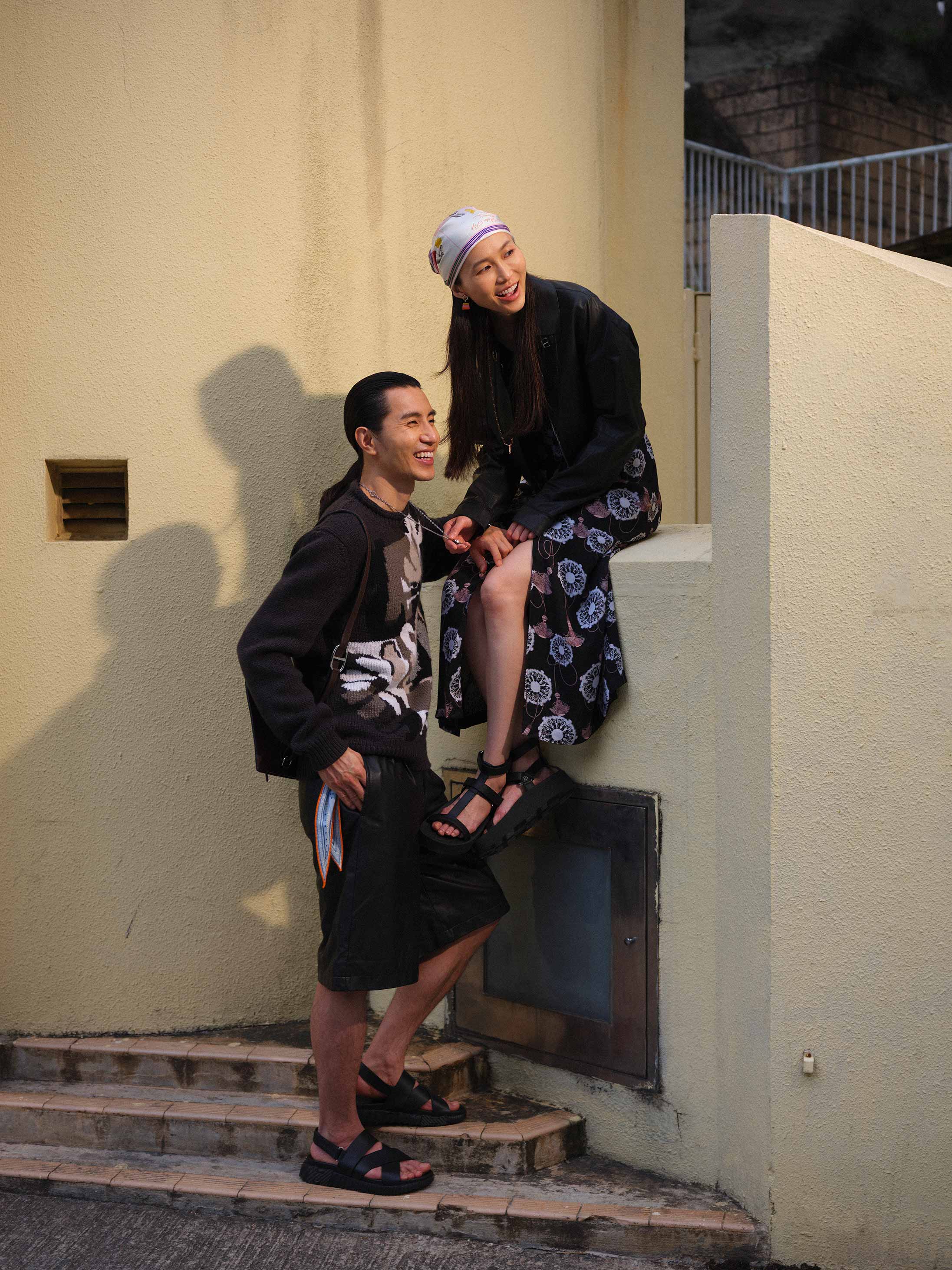 A couple poses in Hermès SS2022 available at Pacific Place