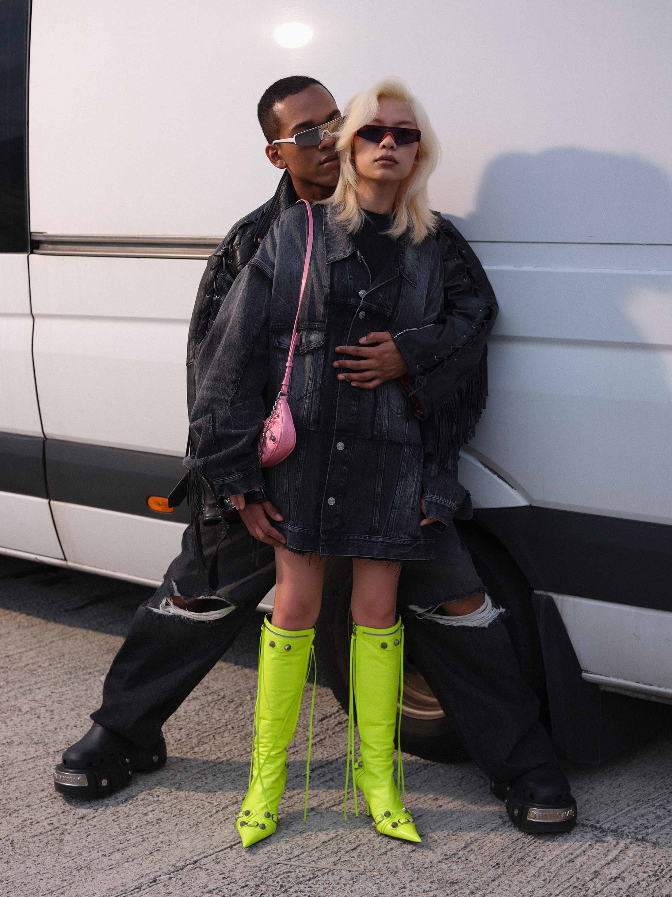 A couple poses in Balenciaga SS2022 available at Pacific Place