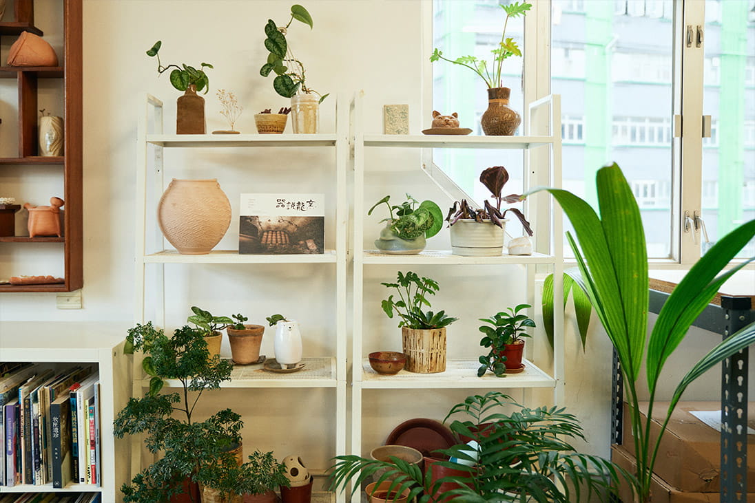 A shelf of ceramics and objects at KUMP Studio Hong Kong