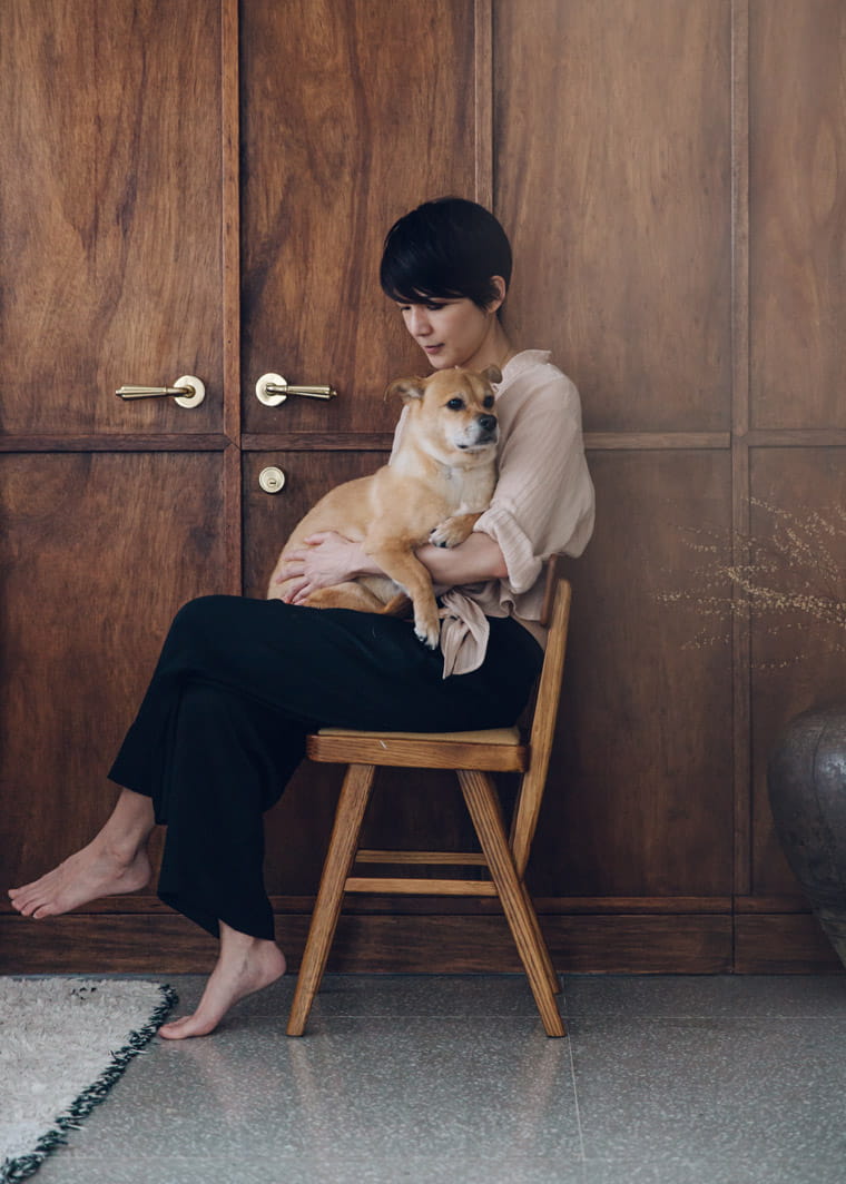Three dogs share the space with Mandy Lee and her husband