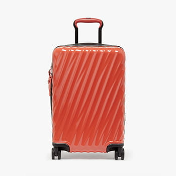 TUMI International Expandable 4 Wheel Carry-On in Coral