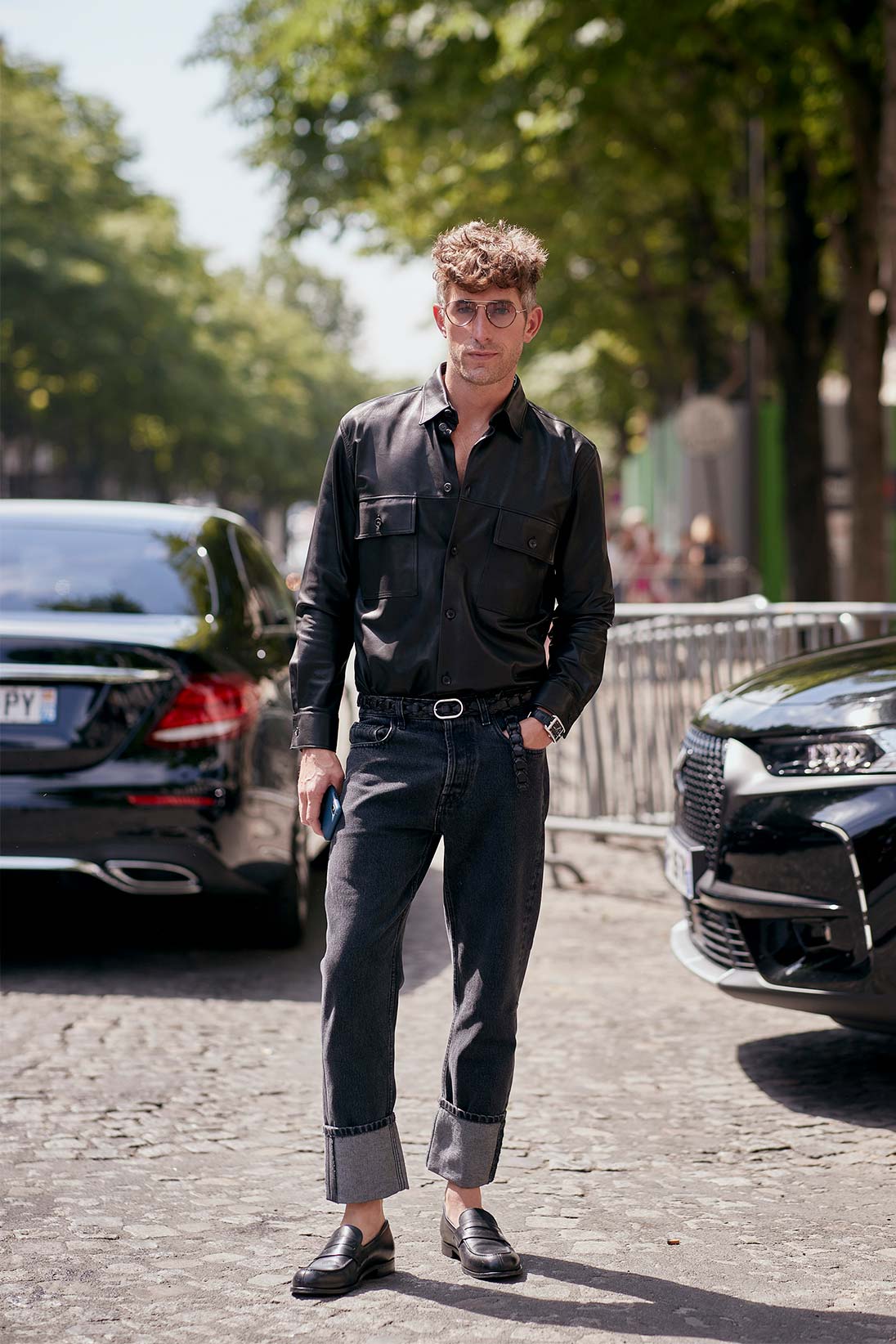 A man wearing dark jeans