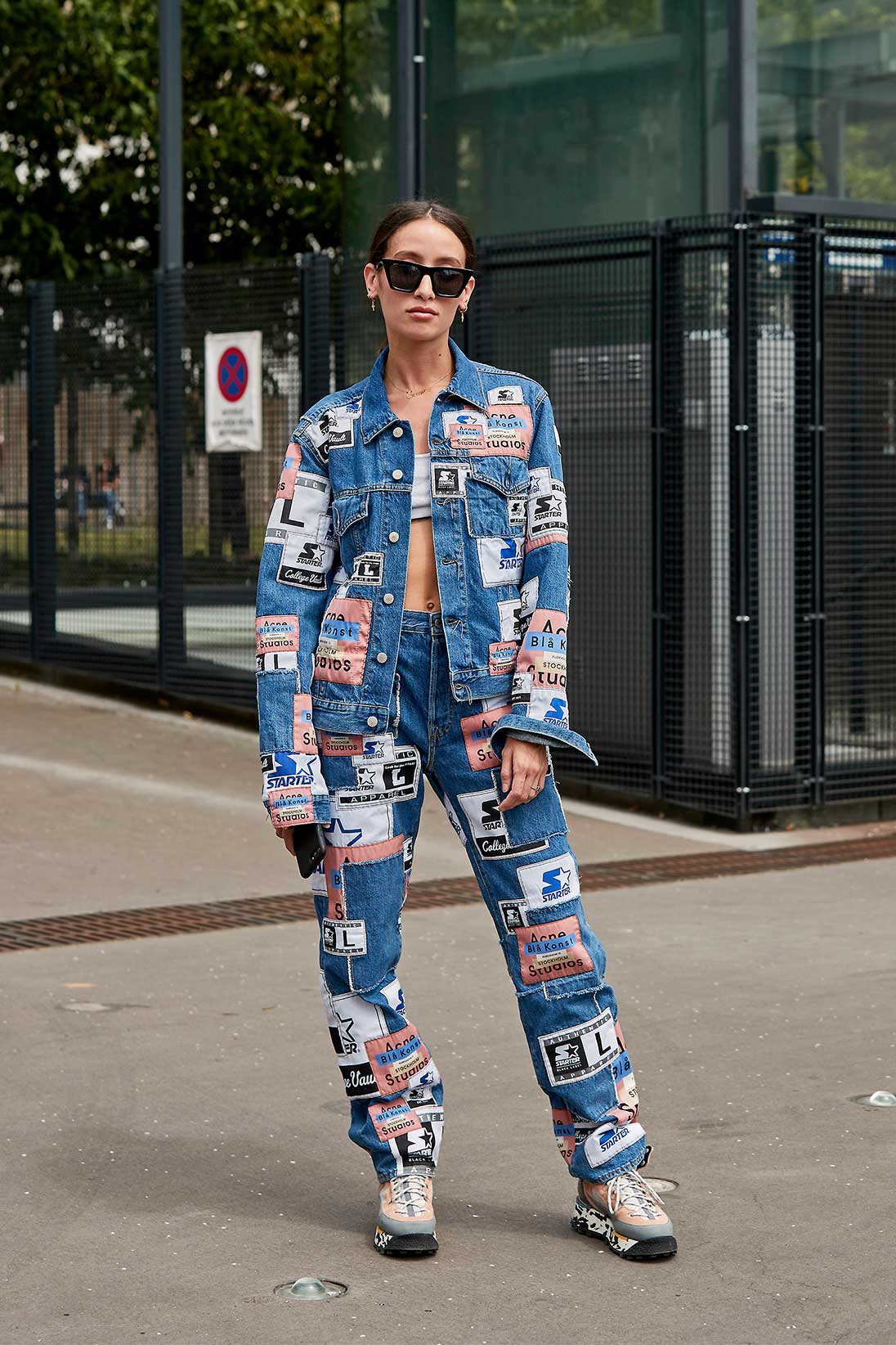 A woman wearing logo jeans