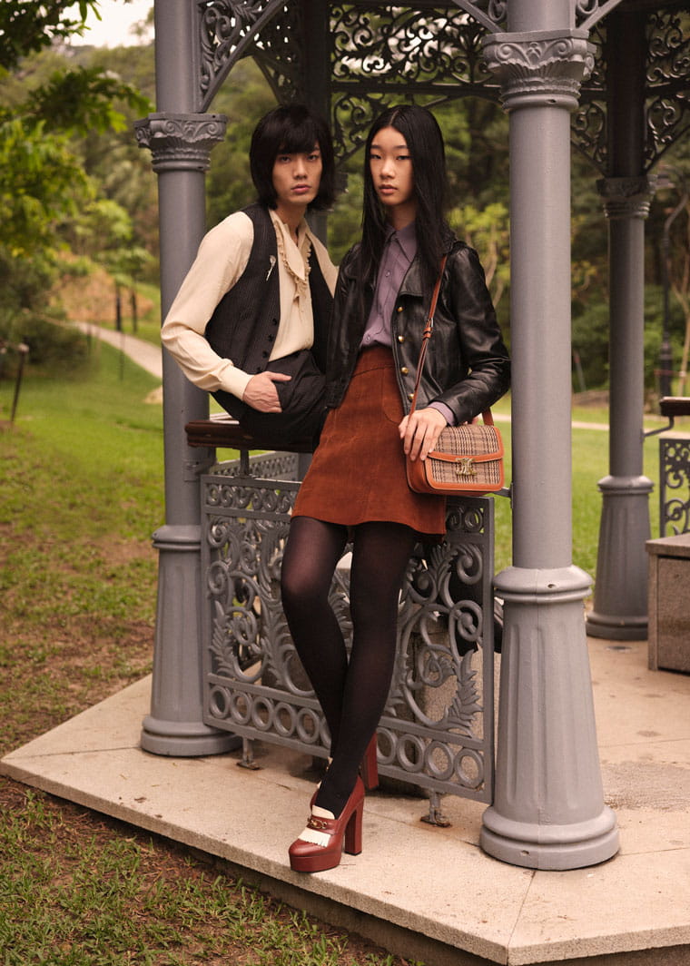 Male and female models pose in Céline
