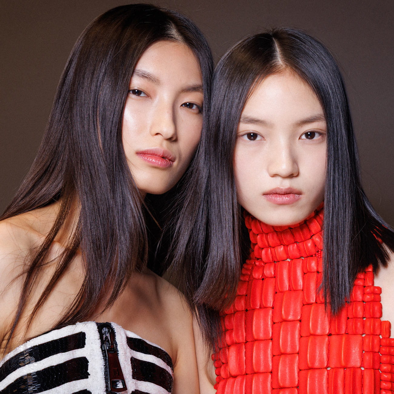 Asian models demonstrating a Gen Z barely-there skincare look