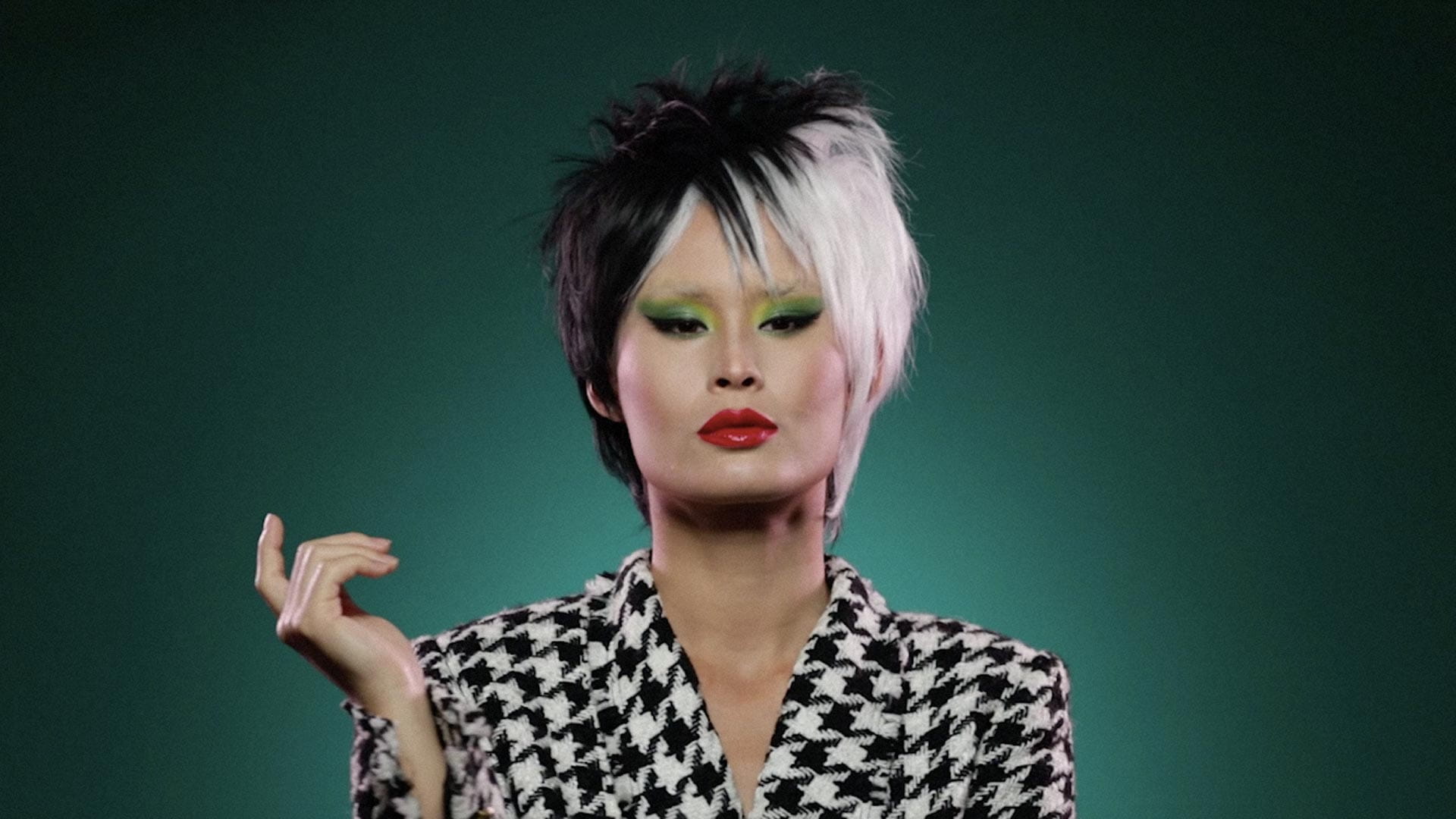 A model made up as Cruella de Vil from 101 Dalmatians
