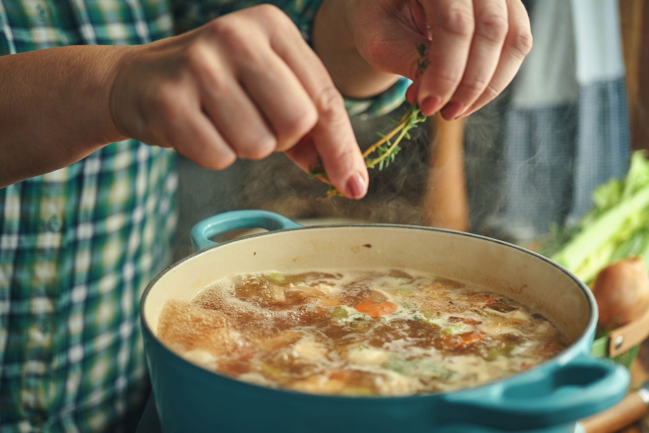 A person making broth