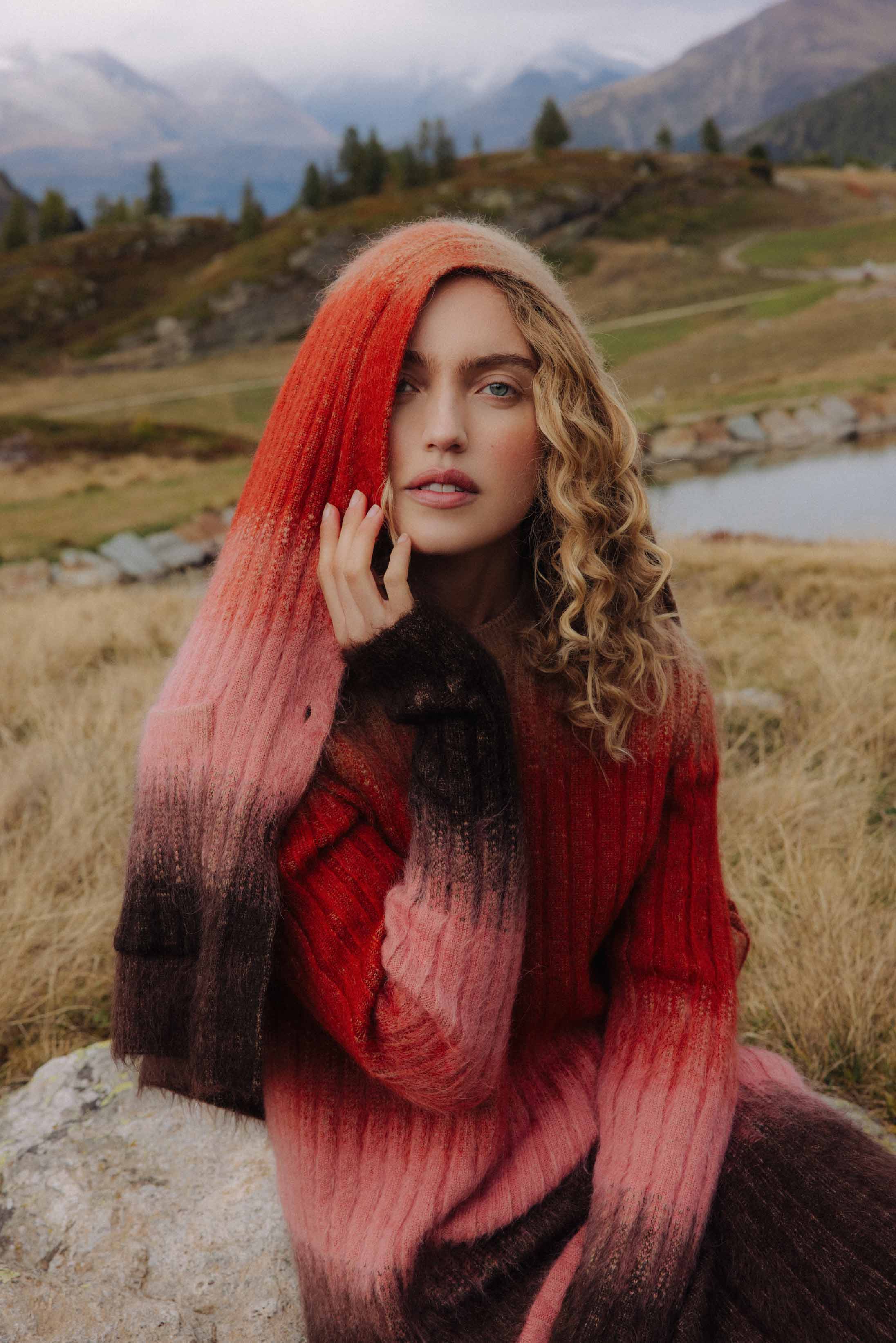 A model poses wearing Fendi in the Italian Alps