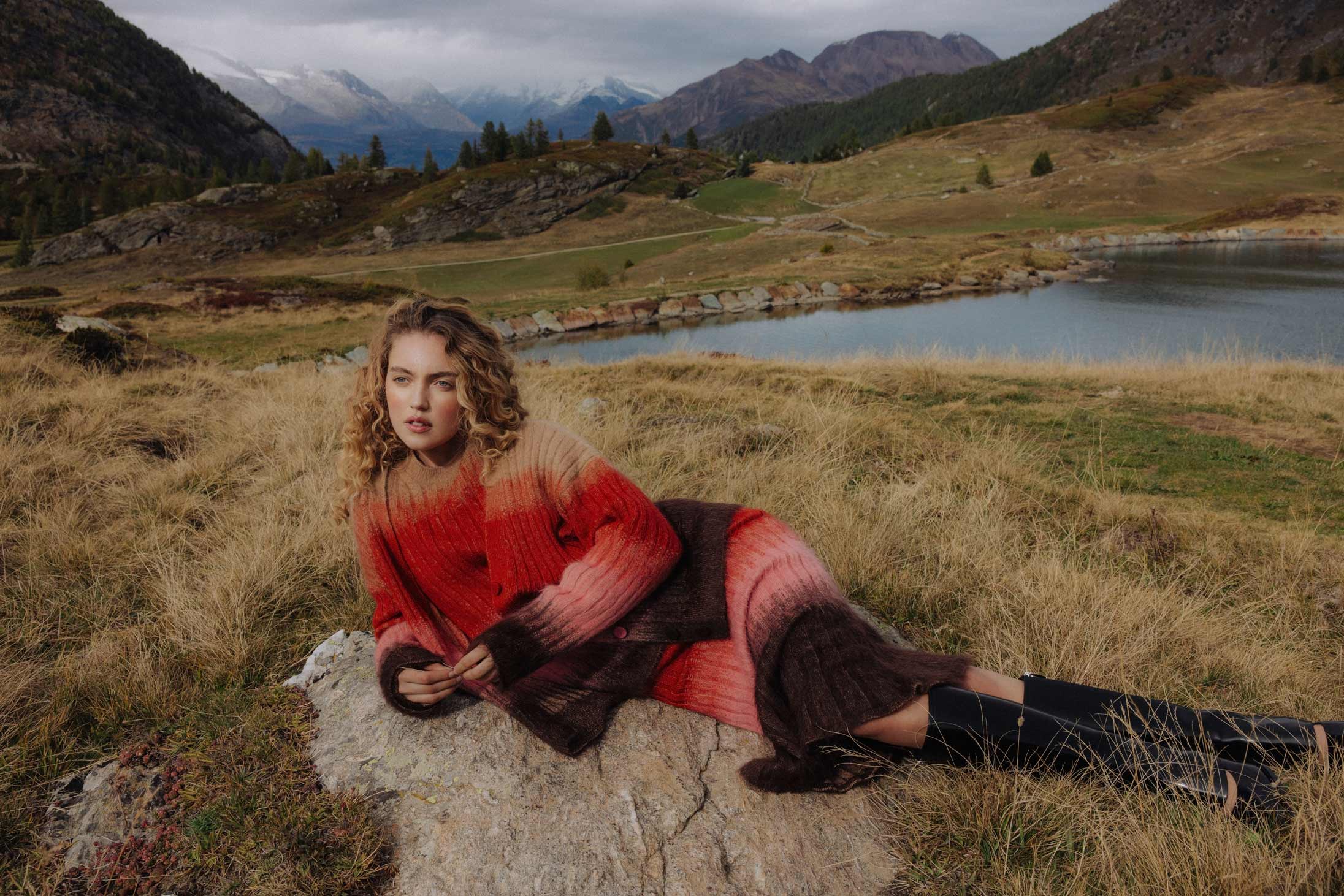 A model poses wearing Fendi in the Italian Alps