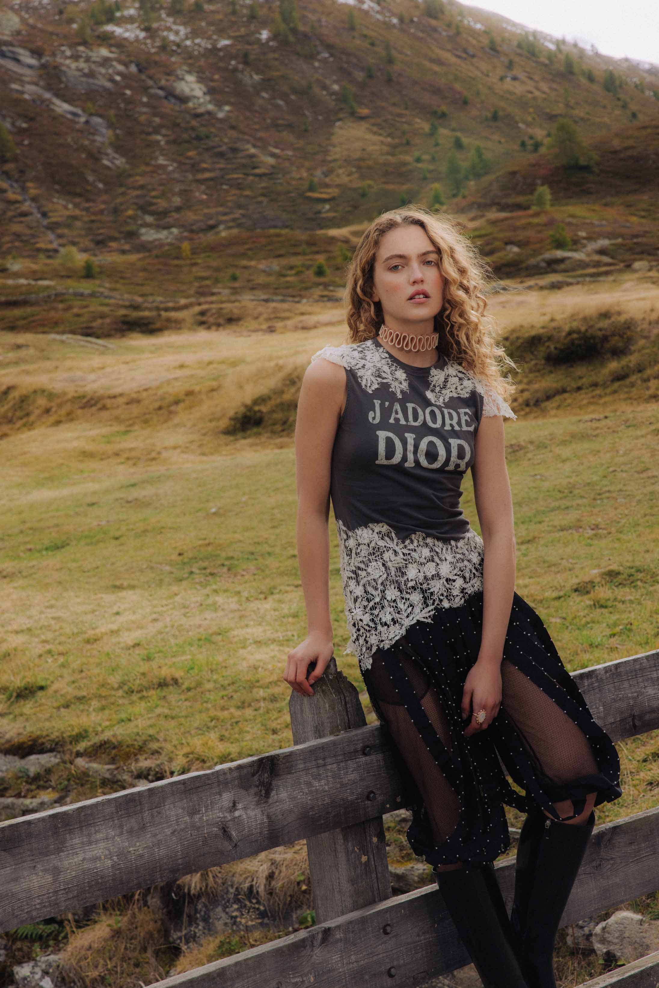 A model poses wearing Dior in the Italian Alps