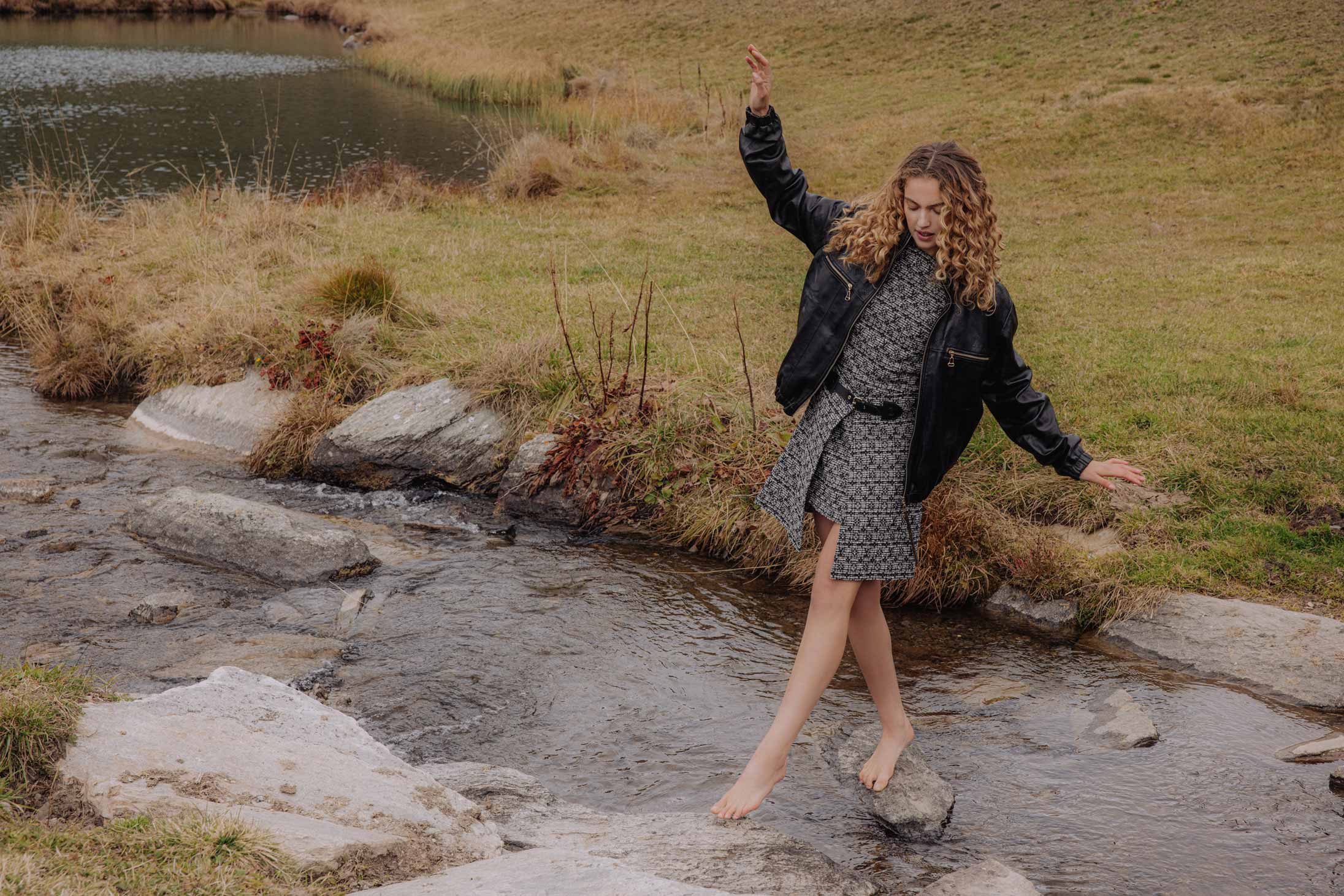 A model poses wearing Louis Vuitoon in the Italian Alps