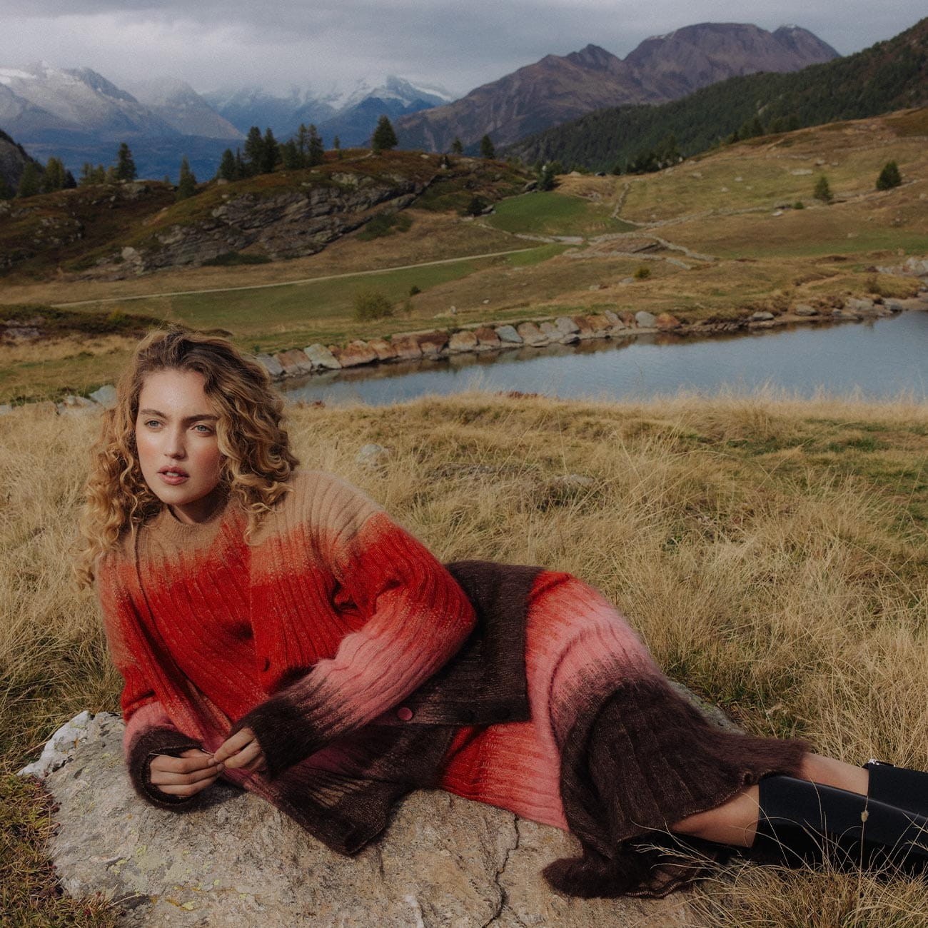 A model poses wearing Fendi in the Italian Alps