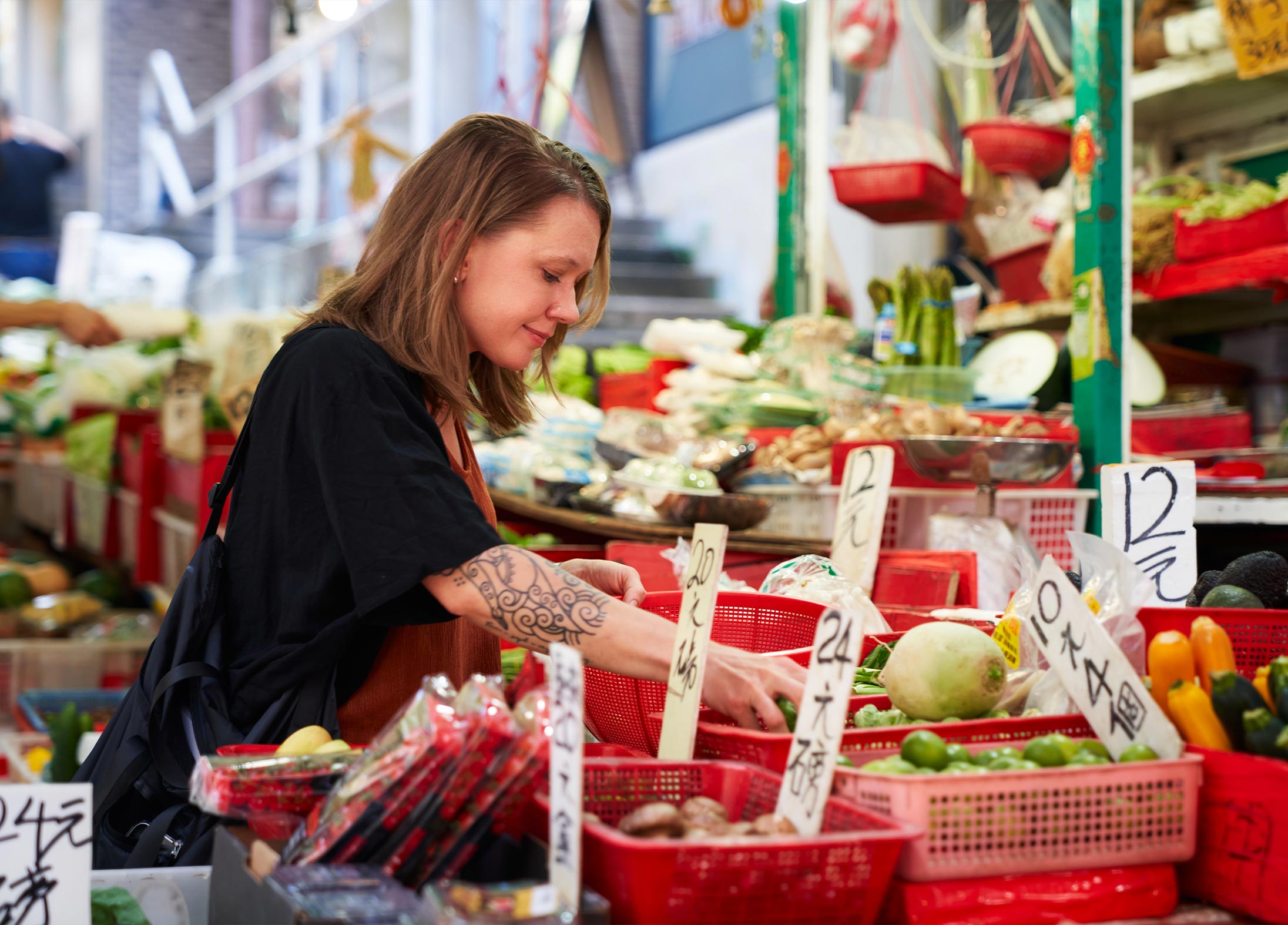 Black Sheep Restaurant Group's Pastry Chef Karys Plaxe shops at a wet market