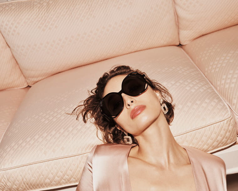 A model wearing Linda Farrow Jerry sunglasses