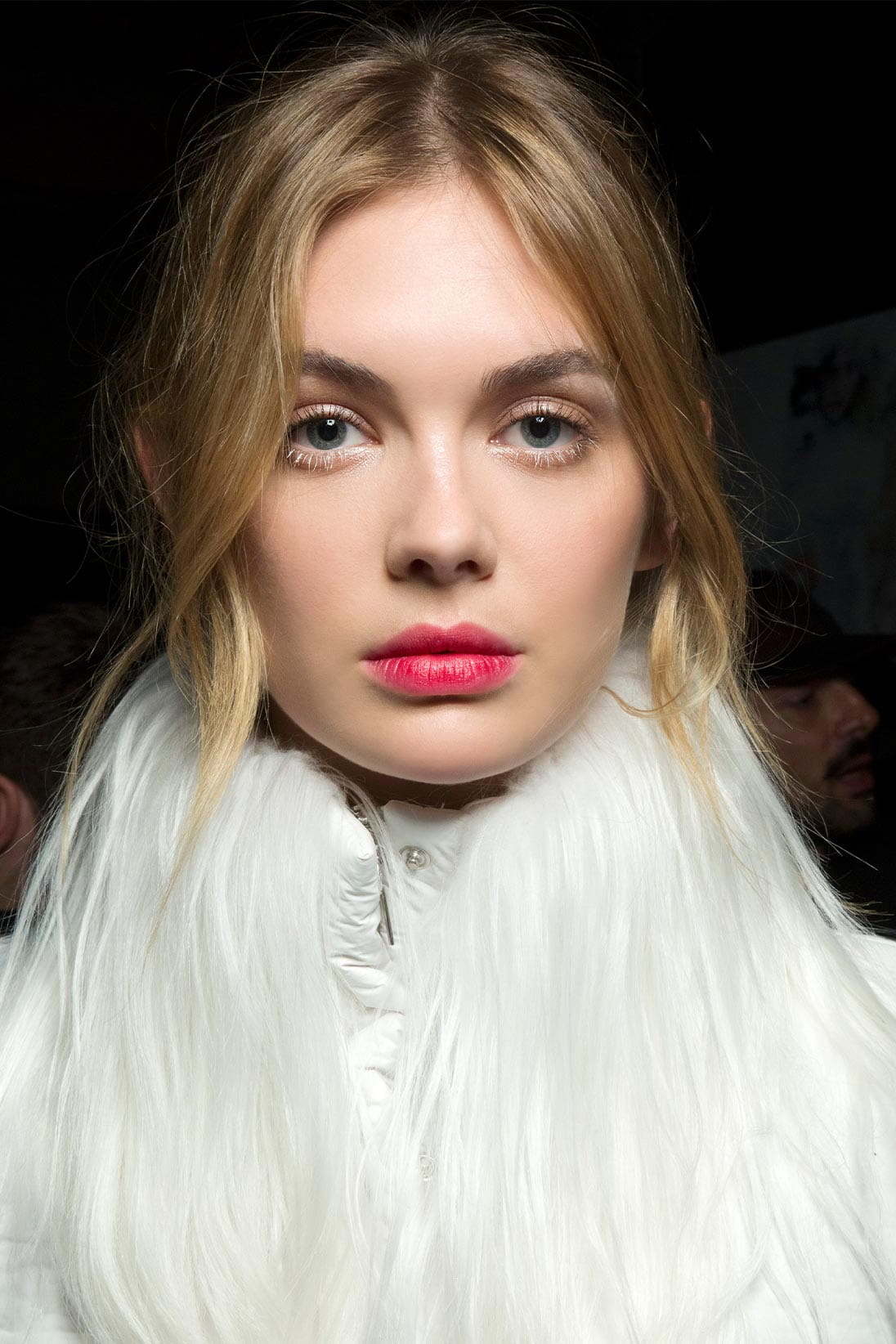 A model wearing pink lipstick available at Pacific Place