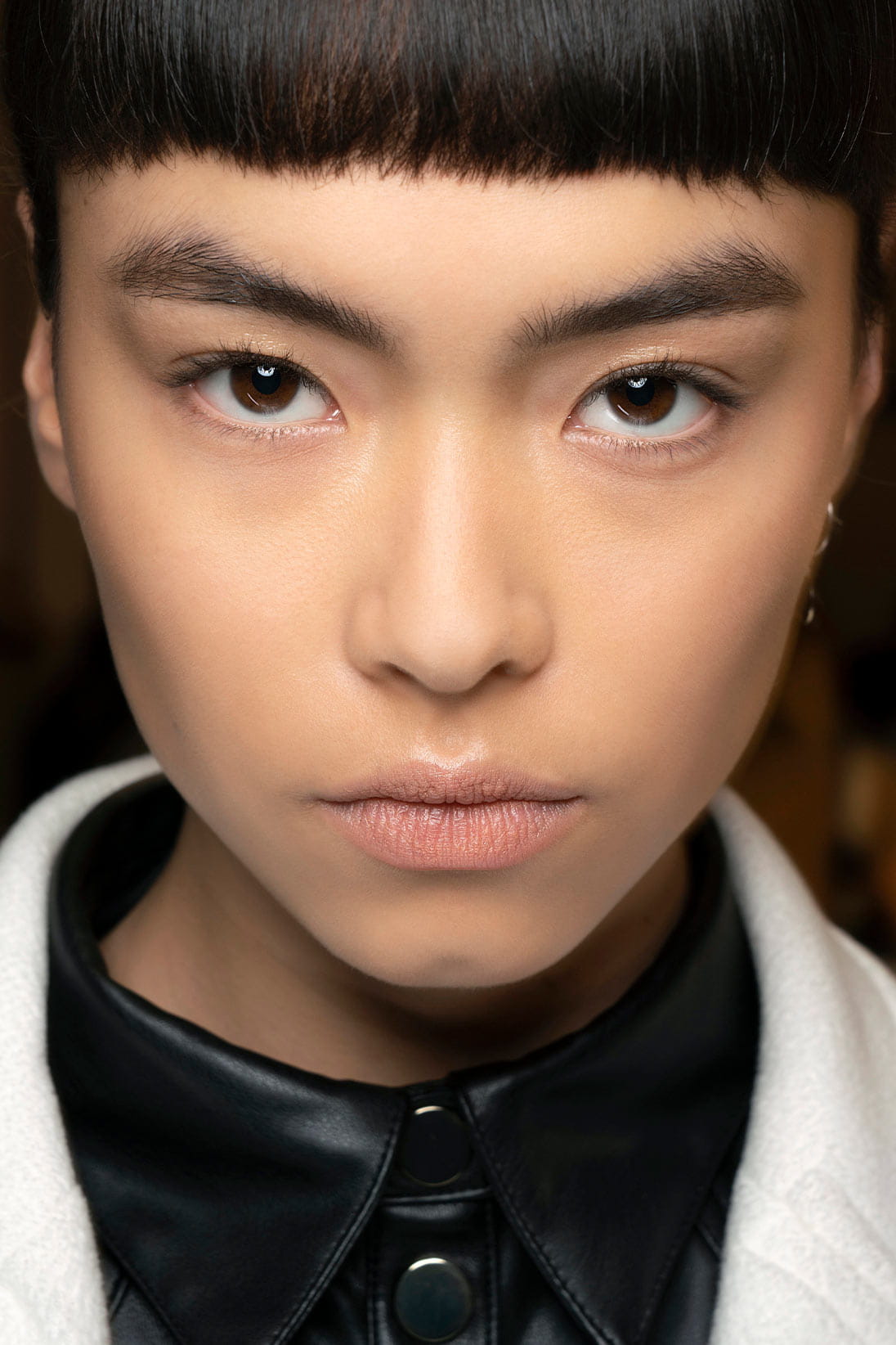 A model wearing nude lipstick available at Pacific Place