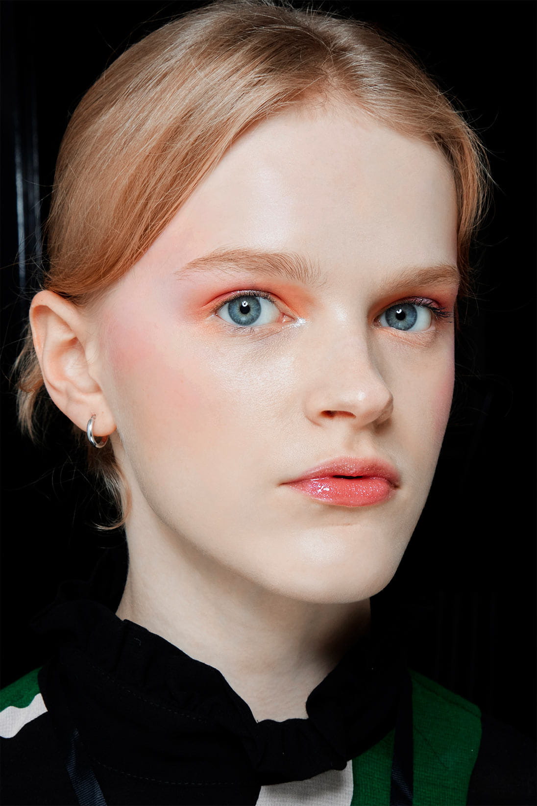 A model wearing shaded lip balm available at Pacific Place