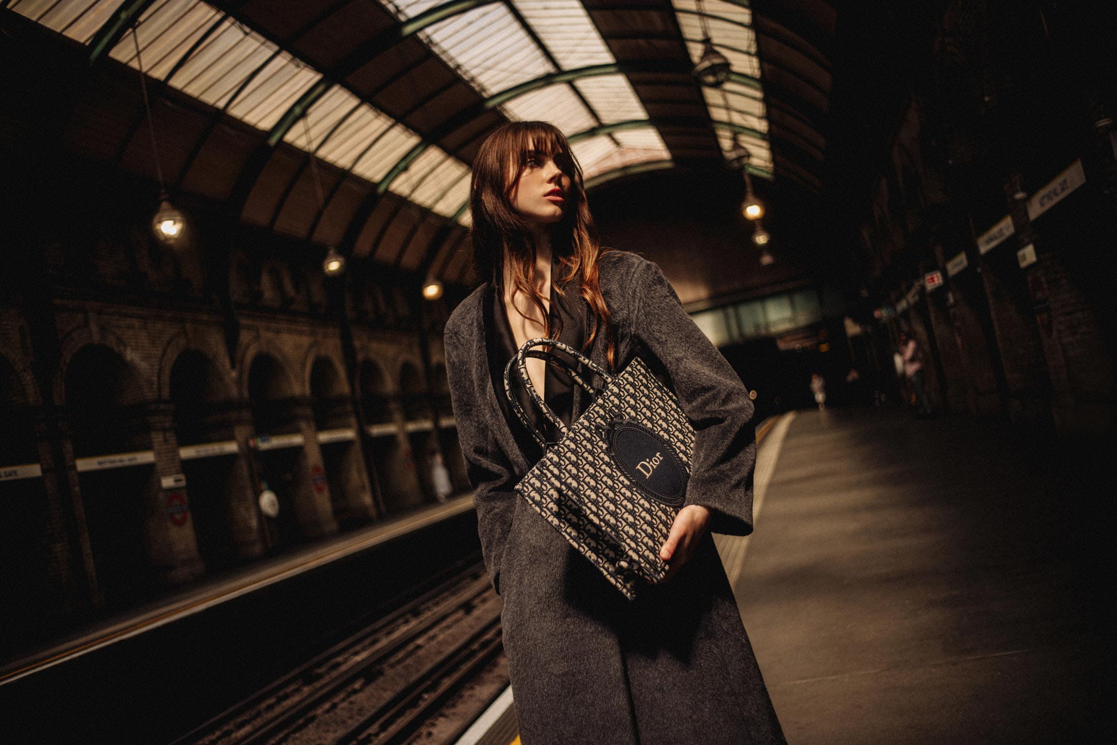 A model poses in London wearing DIOR