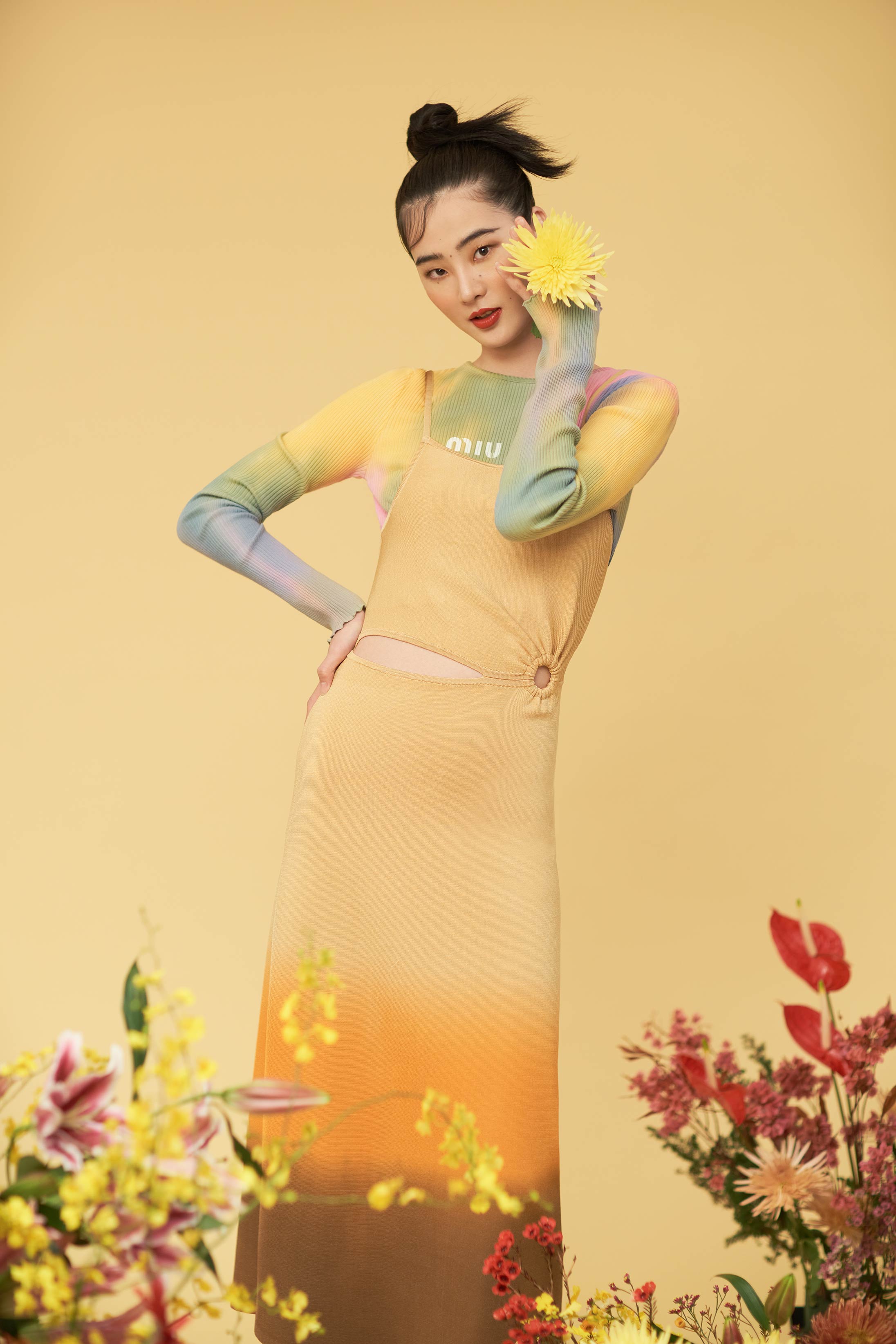 A model poses in Miu Miu and Sandro available at Pacific Place
