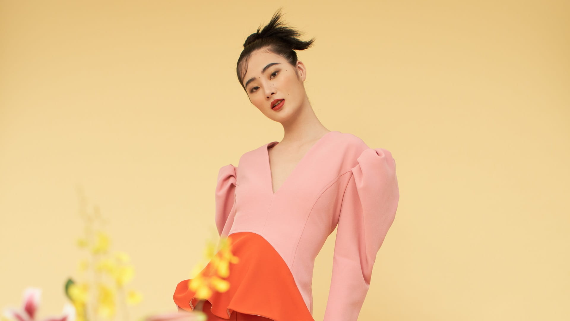 A model poses in Brøgger, Raf Simons and Louis Vuitton available at Pacific Place