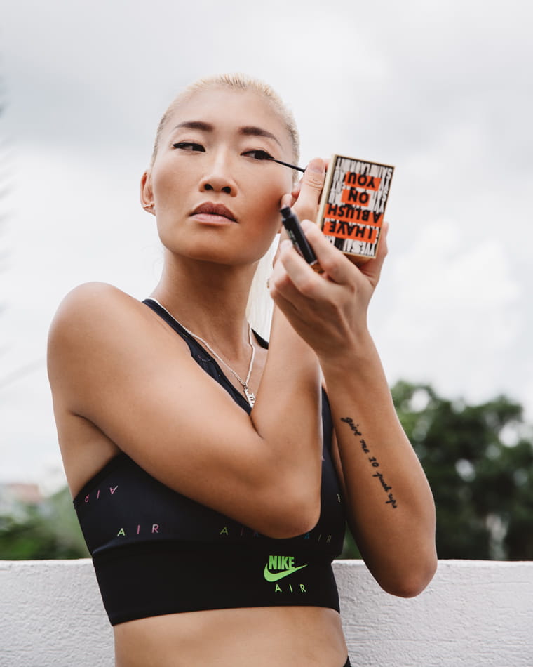 Nike Master Trainer Utah Lee poses with eyeliner