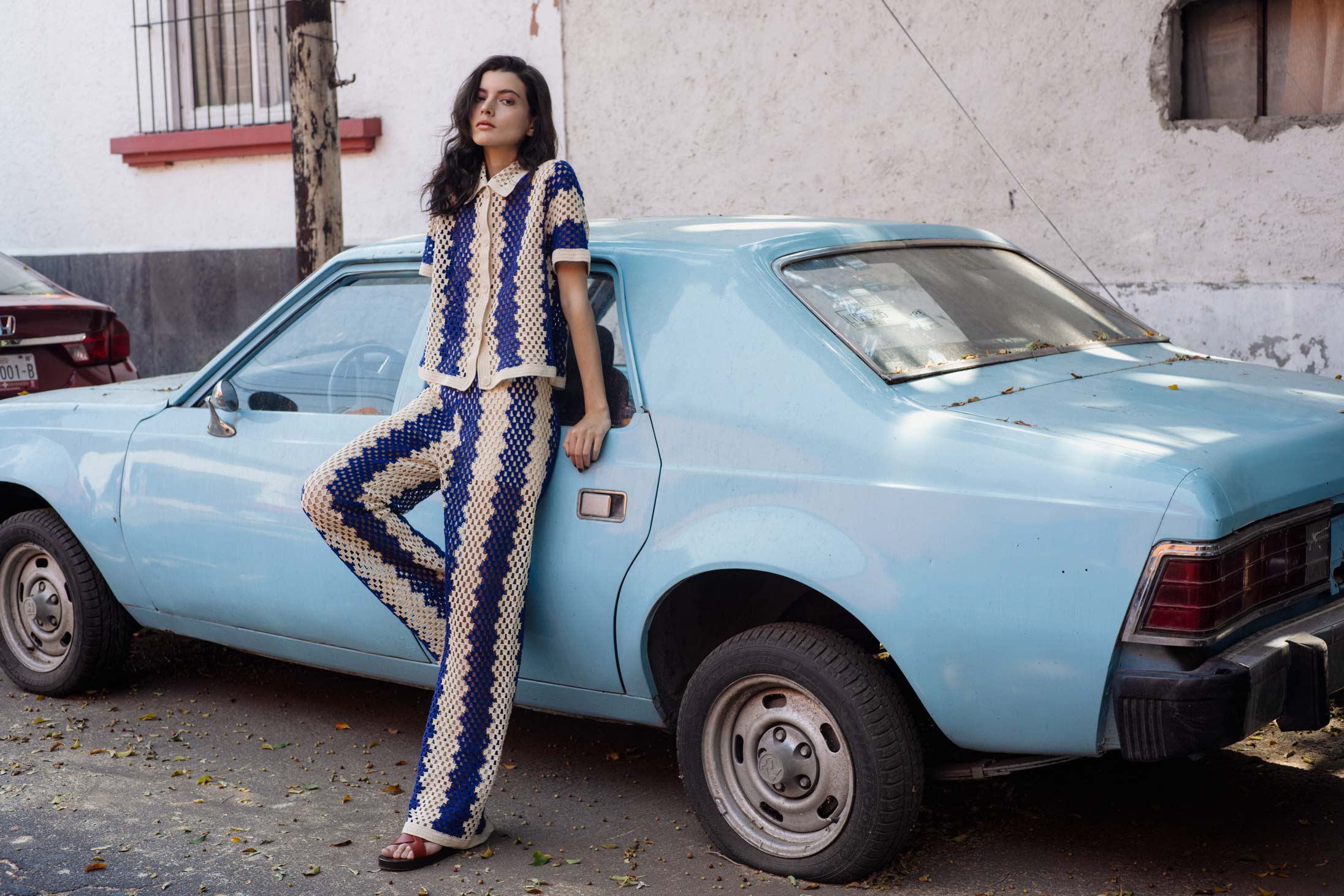 A model poses in Mexico City wearing Sandro and Loro Piana