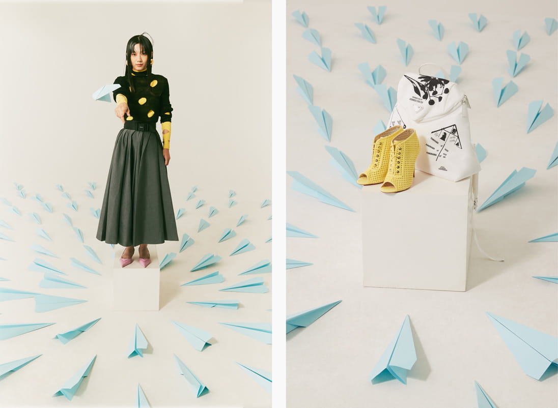 A model poses in Prada and Balenciaga
