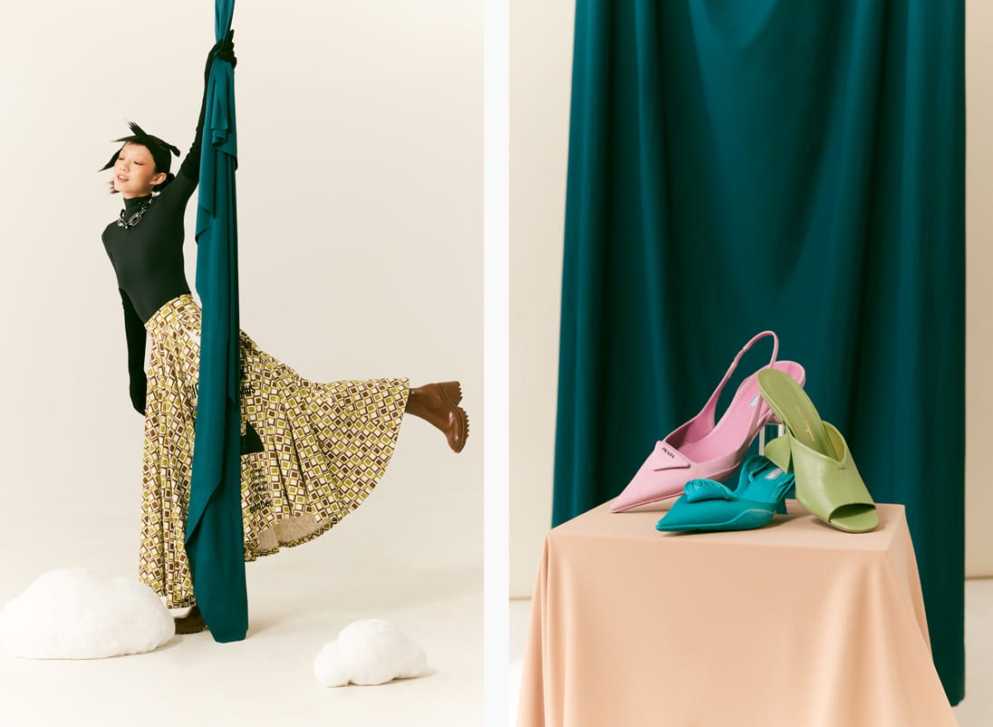 A model poses in Prada, Marc Jacobs, Balenciaga, Louis Vuitton and Chloé, next to shoes by Prada and Salvatore Ferragamo