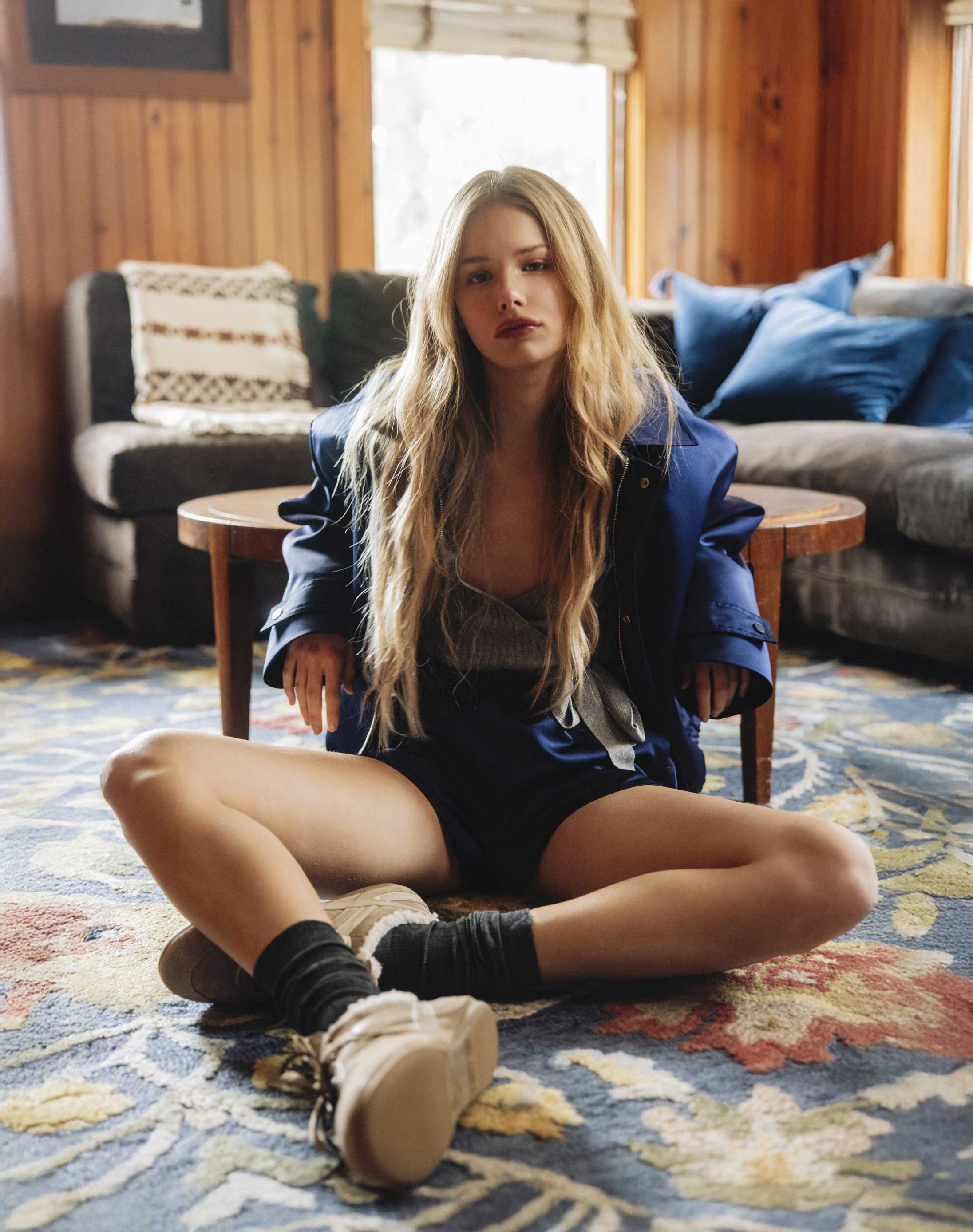 A model poses in MAX&Co. and Miu Miu