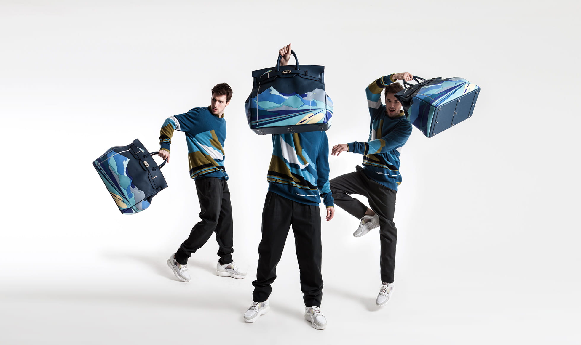 A model wears the latest menswear look from Hermès