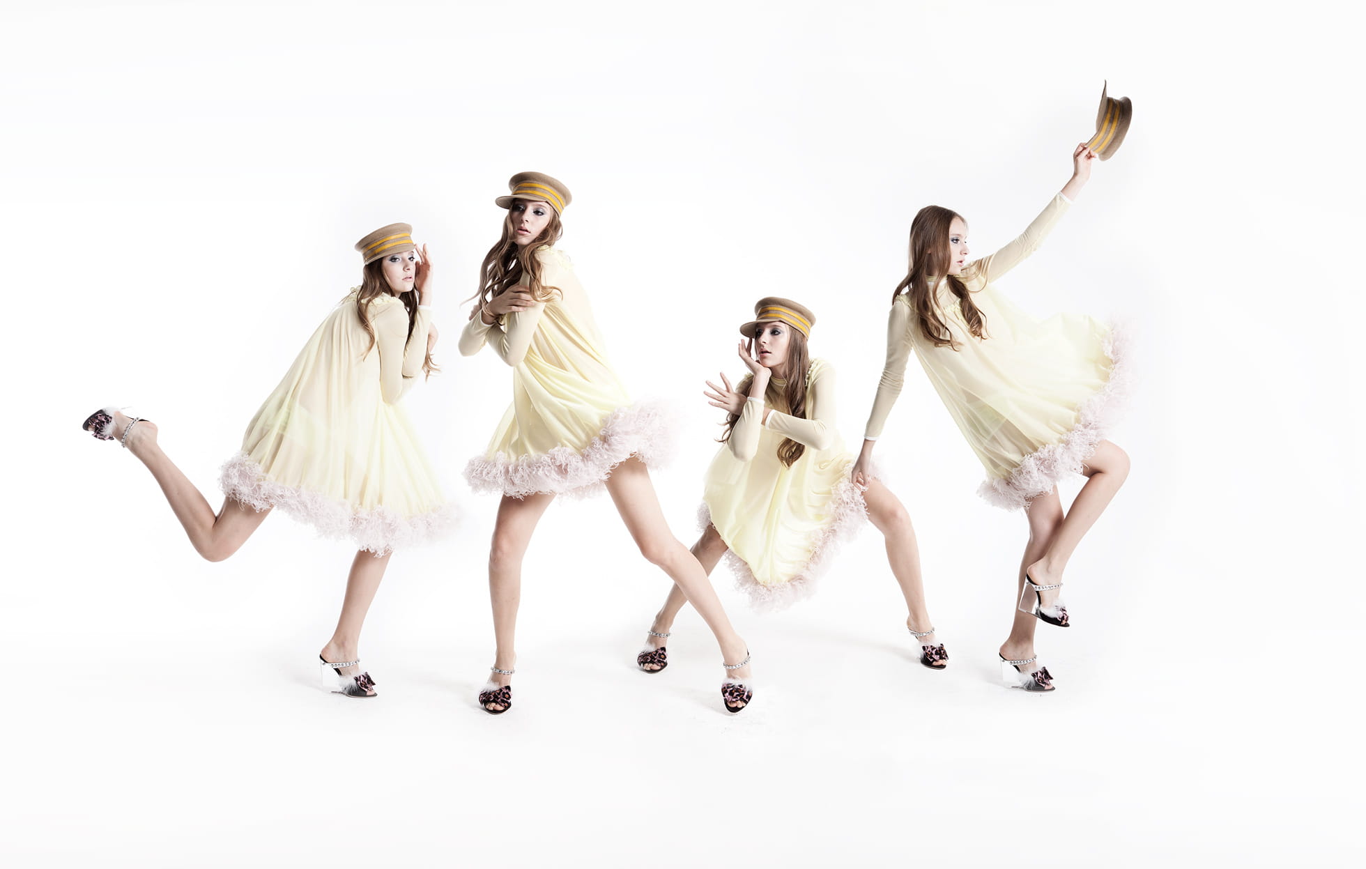 A model strikes poses in a Miu Miu dress and Hermès hat