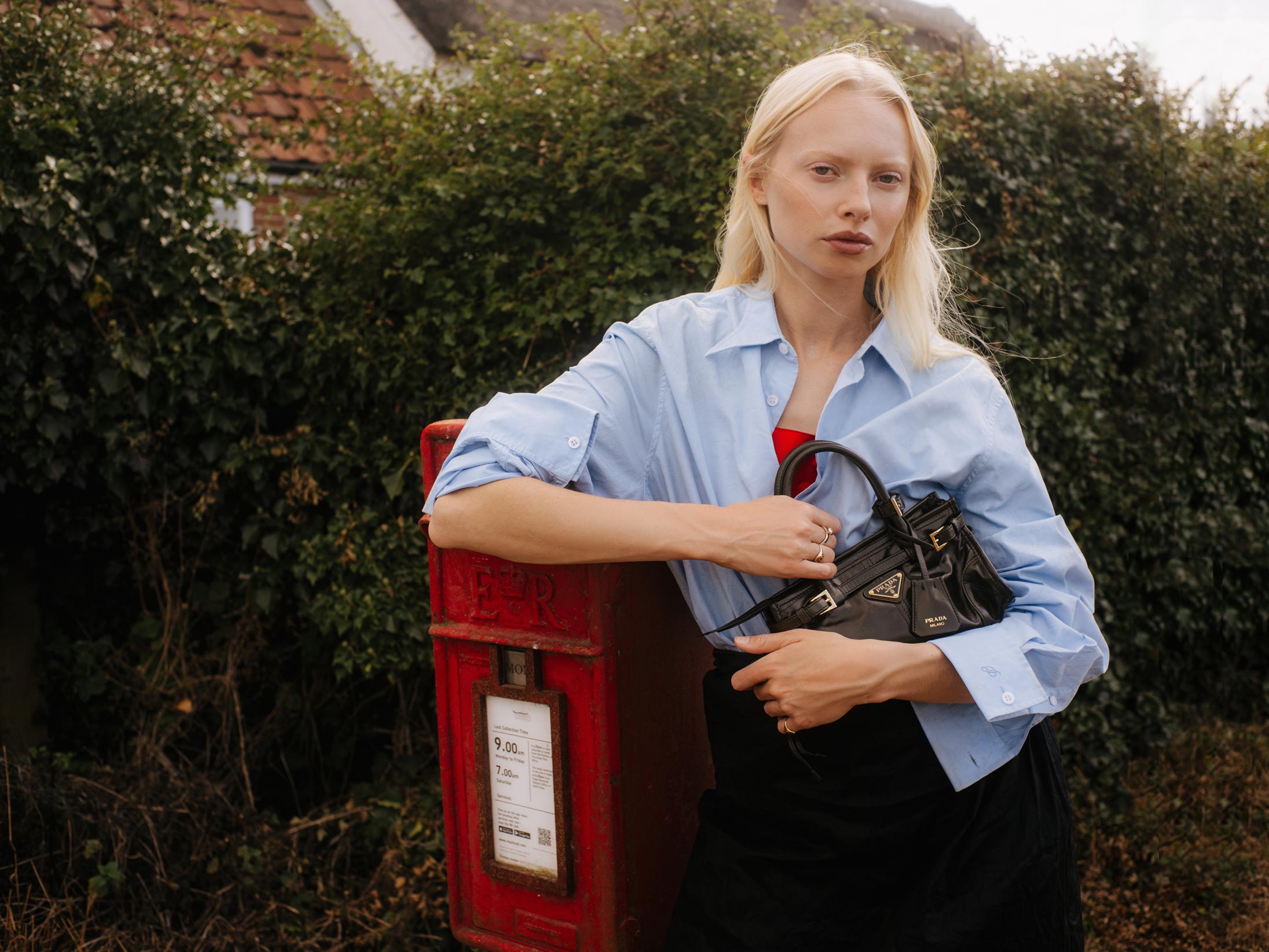A model poses in Norfolk wearing Prada