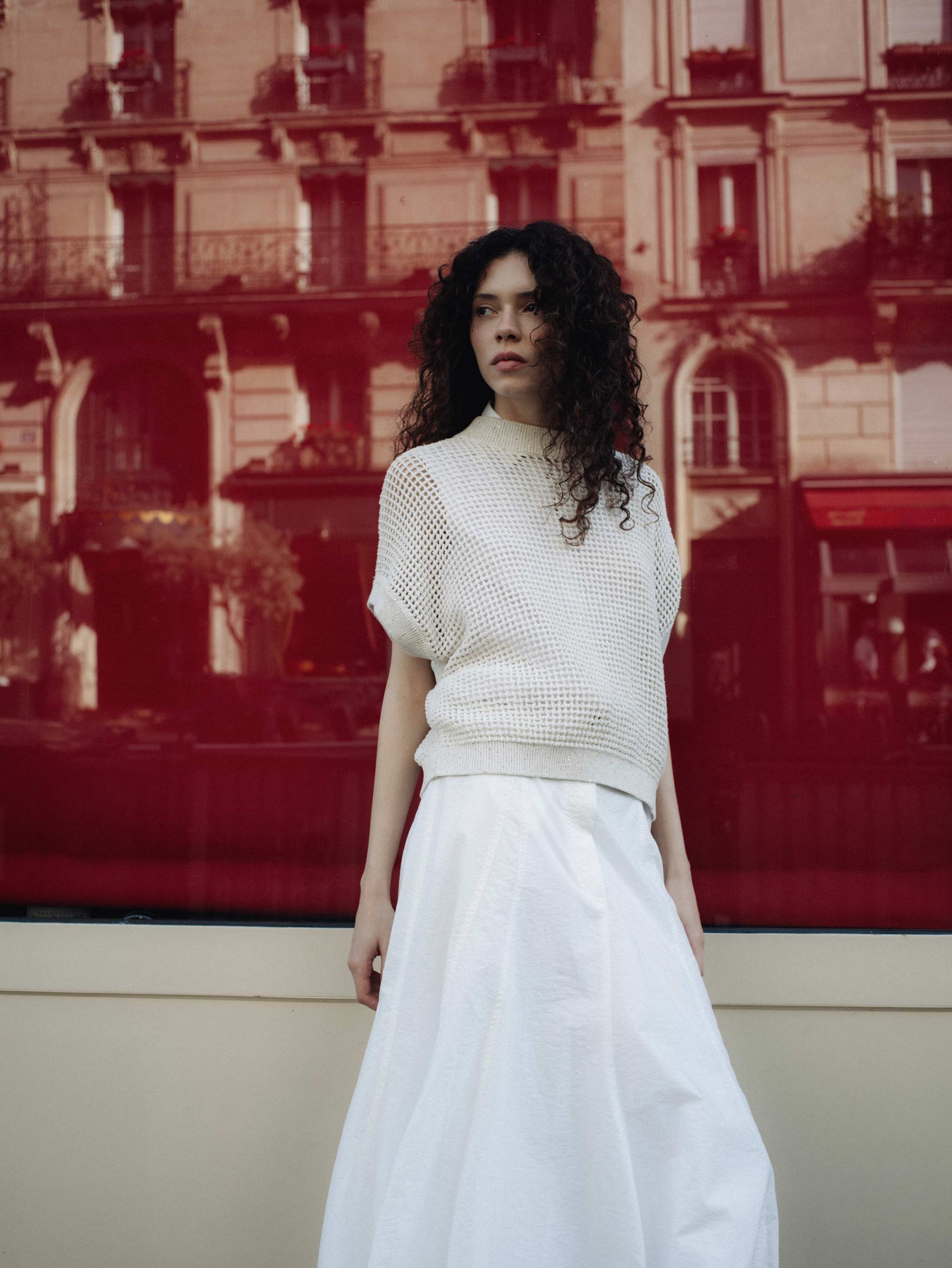 A model poses in Paris wearing Brunello Cuccinelli