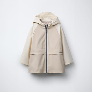 Zara Rubberised Raincoat in Ecru / Beige