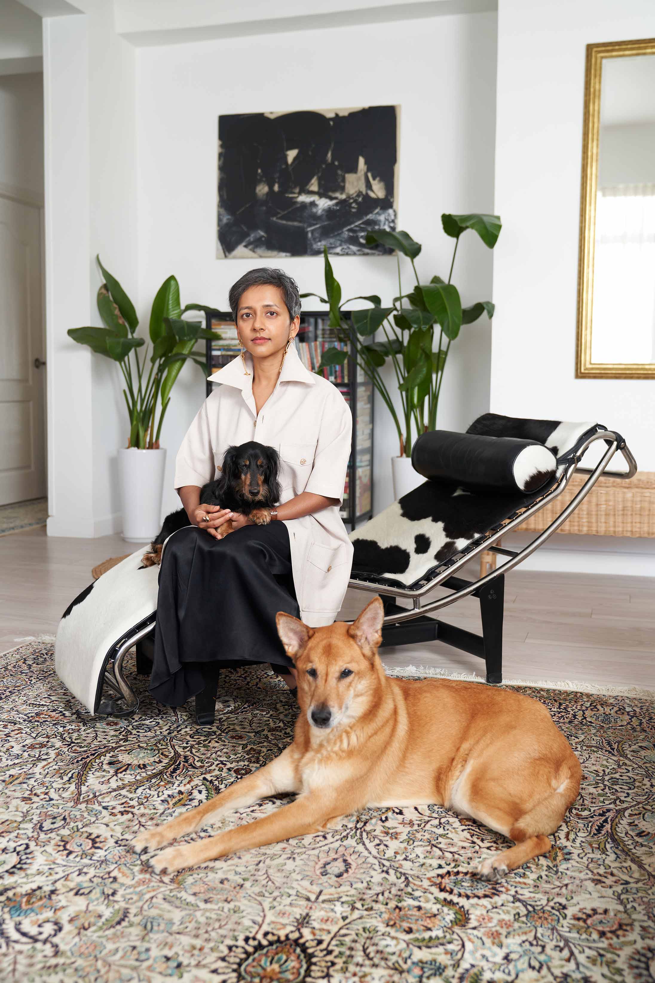 Artist Sai Pradhan in her Hong Kong home with her rescue dogs